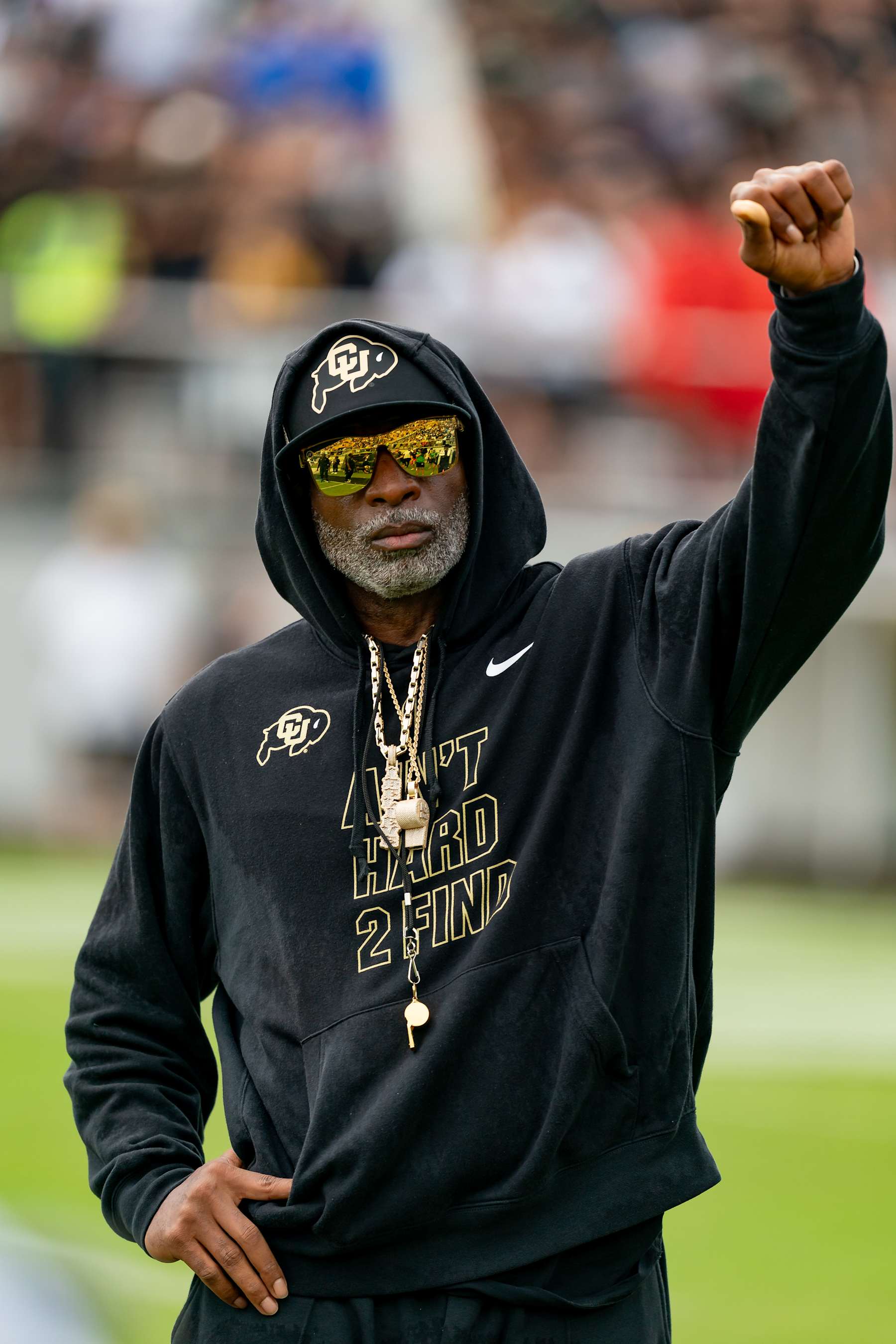 ORLANDO, FL - SEPTEMBER 28: Colorado Buffaloes head coach Deion Sanders holds up a fist during warm ups before a college football game between the Colorado Buffaloes and the UCF Knights on September 28th, 2024 at FBC Mortgage Stadium in Orlando, FL. (Photo by Chris Leduc/Icon Sportswire via Getty Images)