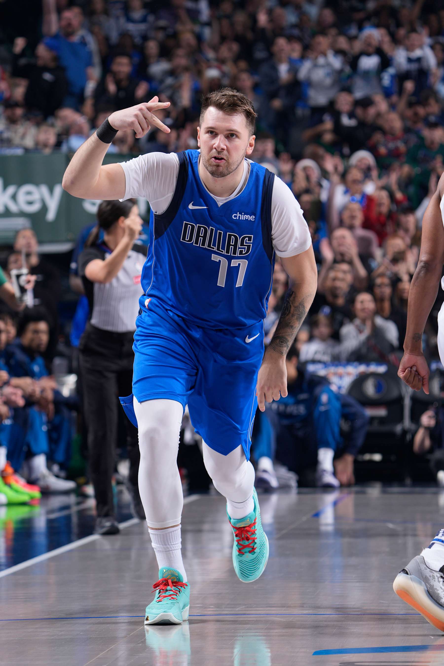 DALLAS, TX - DECEMBER 25: Luka Doncic #77 of the Dallas Mavericks celebrates during the game against the Minnesota Timberwolves  on December 25, 2024 at American Airlines Center in Dallas, Texas. NOTE TO USER: User expressly acknowledges and agrees that, by downloading and or using this photograph, User is consenting to the terms and conditions of the Getty Images License Agreement. Mandatory Copyright Notice: Copyright 2024 NBAE (Photo by Glenn James/NBAE via Getty Images)