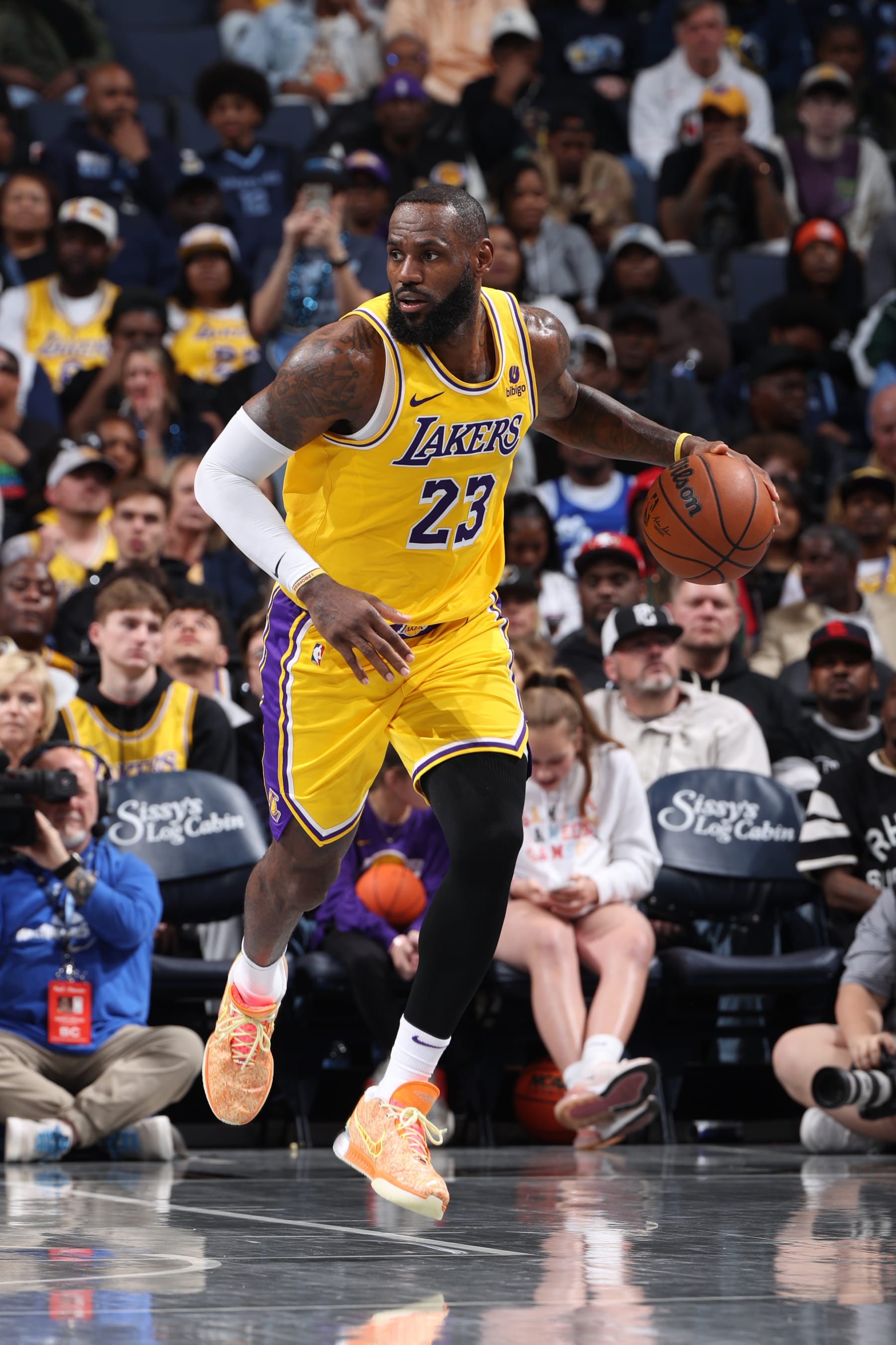 MEMPHIS, TN - MARCH 27: LeBron James #23 of the Los Angeles Lakers dribbles the ball during the game against the Memphis Grizzlies on March 27, 2024 at FedExForum in Memphis, Tennessee. NOTE TO USER: User expressly acknowledges and agrees that, by downloading and or using this photograph, User is consenting to the terms and conditions of the Getty Images License Agreement. Mandatory Copyright Notice: Copyright 2024 NBAE (Photo by Joe Murphy/NBAE via Getty Images)