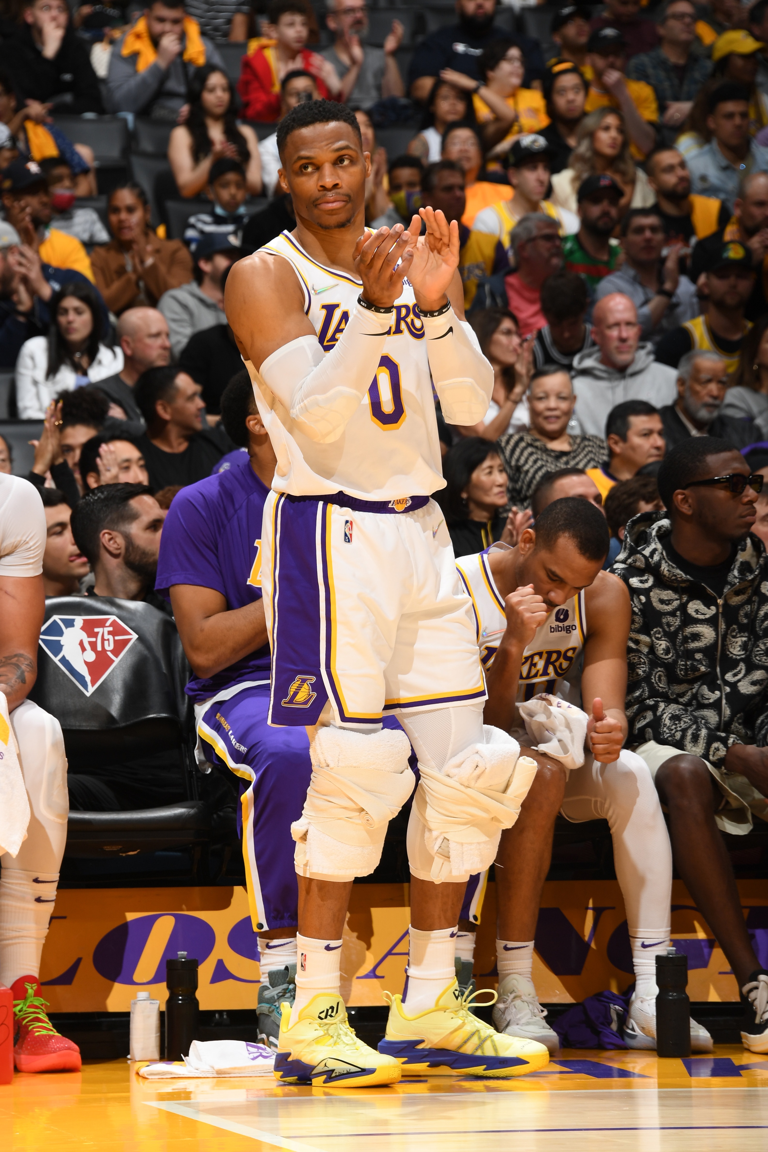 LOS ANGELES, CA - APRIL 3: Russell Westbrook #0 of the Los Angeles Lakers cheers during the game against the Denver Nuggets on April 3, 2022 at Crypto.Com Arena in Los Angeles, California. NOTE TO USER: User expressly acknowledges and agrees that, by downloading and/or using this Photograph, user is consenting to the terms and conditions of the Getty Images License Agreement. Mandatory Copyright Notice: Copyright 2022 NBAE (Photo by Andrew D. Bernstein/NBAE via Getty Images)