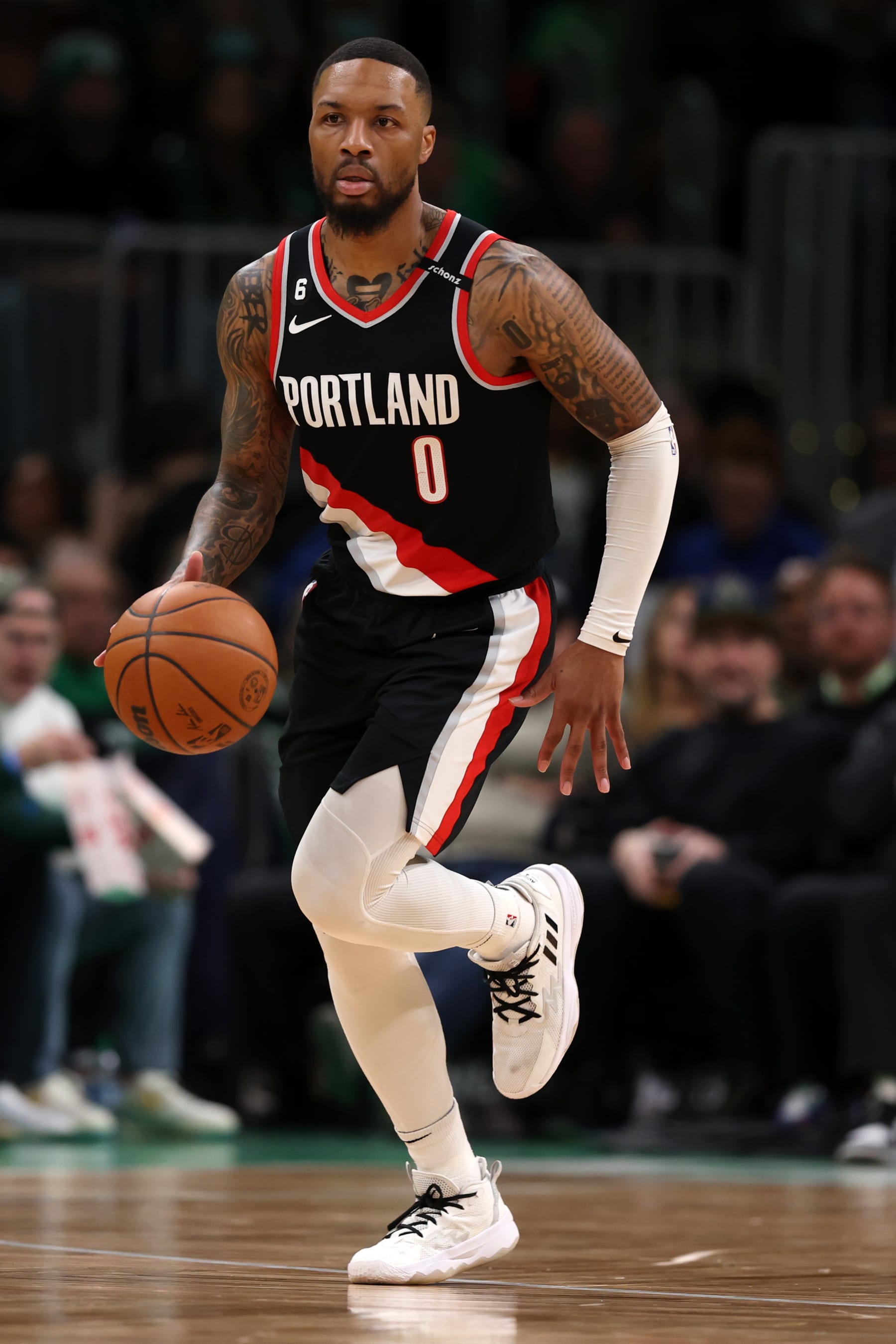 BOSTON, MASSACHUSETTS - MARCH 08: Damian Lillard #0 of the Portland Trail Blazers dribbles against the Boston Celtics at TD Garden on March 08, 2023 in Boston, Massachusetts. NOTE TO USER: User expressly acknowledges and agrees that, by downloading and or using this photograph, User is consenting to the terms and conditions of the Getty Images License Agreement. (Photo by Maddie Meyer/Getty Images)
