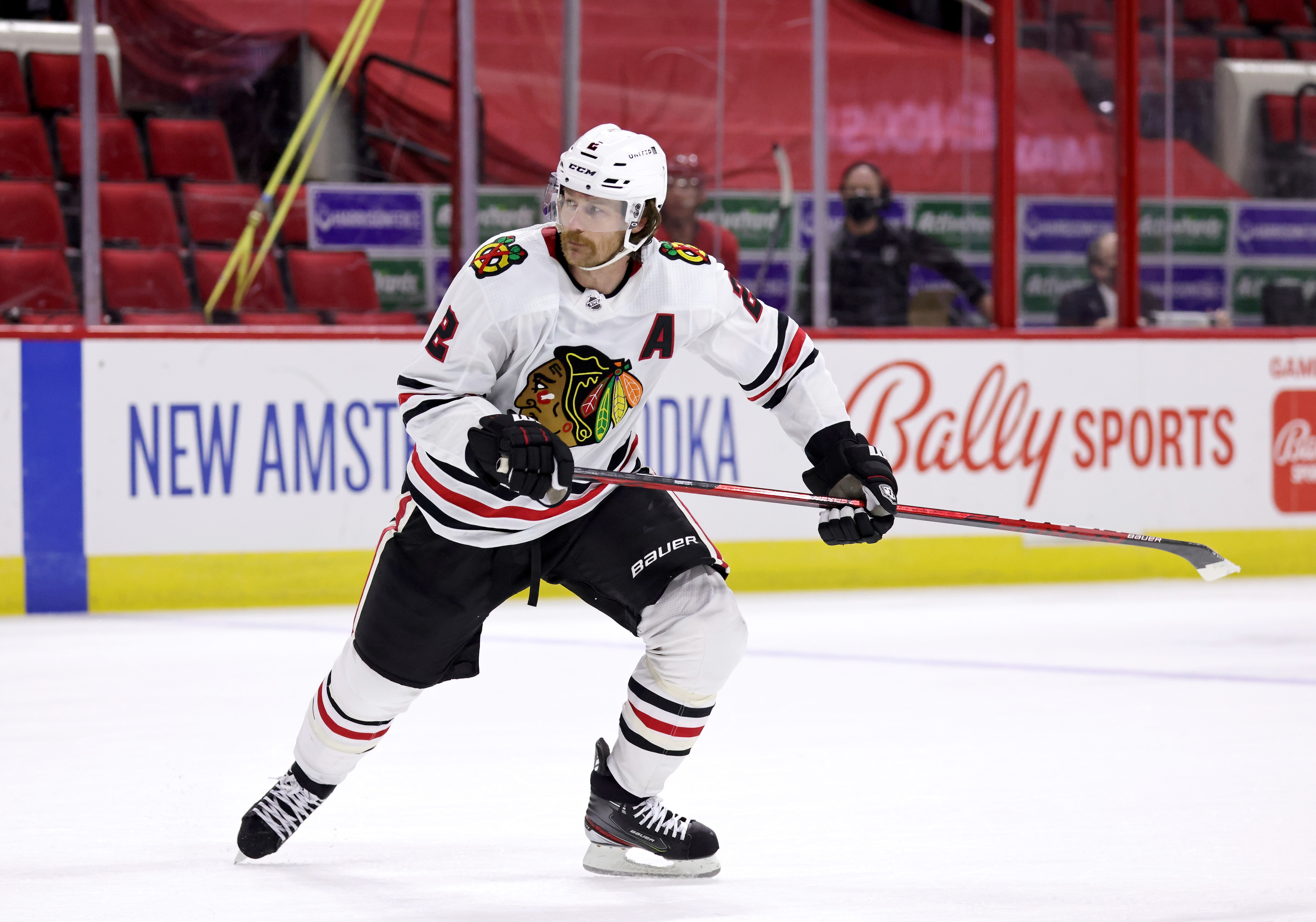 RALEIGH, NC - MAY 4: Duncan Keith #2 of the Chicago Blackhawks skates for position on the ice during an NHL game against the Carolina Hurricanes on May 4, 2021 at PNC Arena in Raleigh, North Carolina. (Photo by Gregg Forwerck/NHLI via Getty Images)