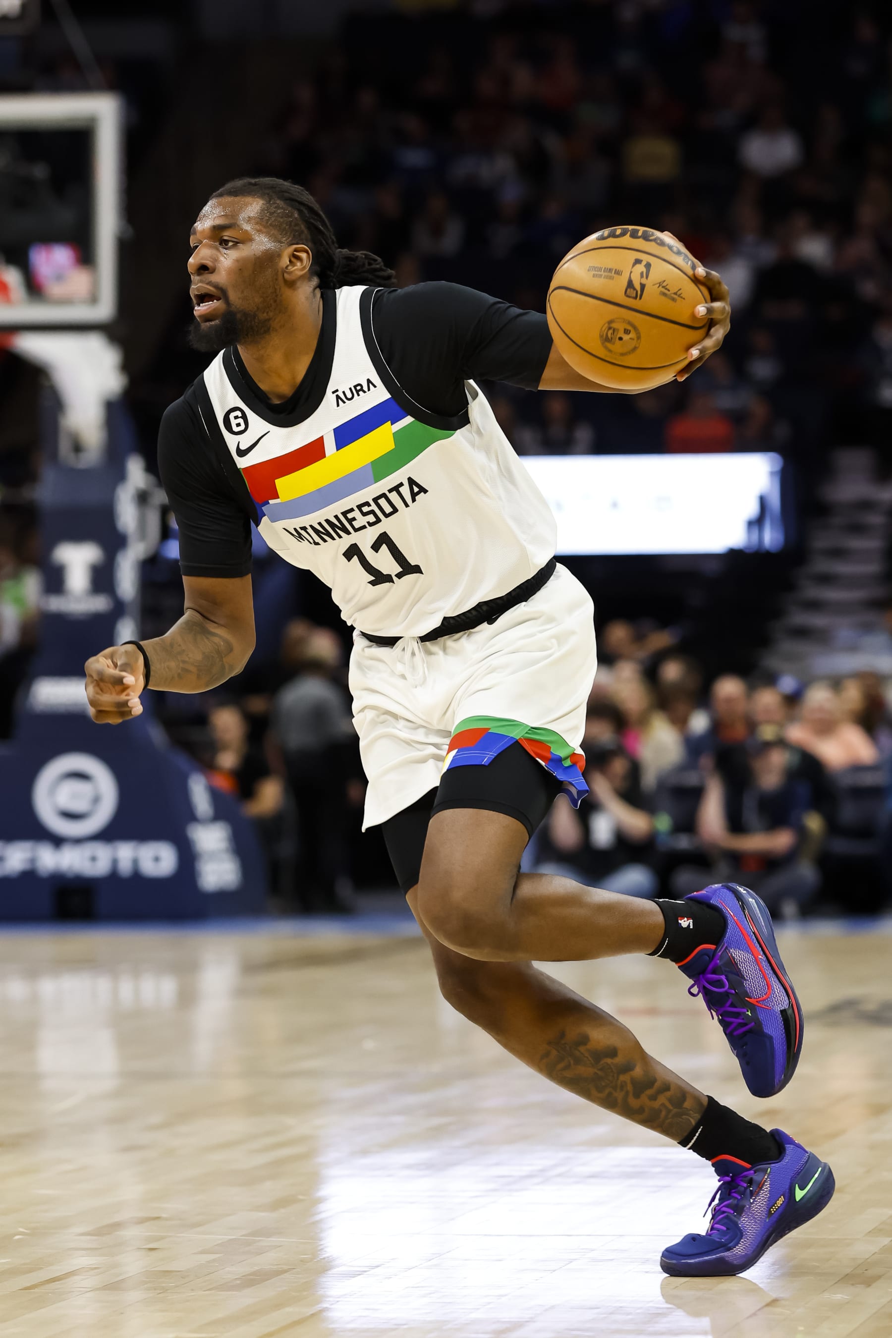 MINNEAPOLIS, MN - DECEMBER 18: Naz Reid #11 of the Minnesota Timberwolves dribbles the ball against the Chicago Bulls in the first quarter of the game at Target Center on December 18, 2022 in Minneapolis, Minnesota. The Timberwolves defeated the Bulls 150-126. NOTE TO USER: User expressly acknowledges and agrees that, by downloading and or using this Photograph, user is consenting to the terms and conditions of the Getty Images License Agreement. (Photo by David Berding/Getty Images)