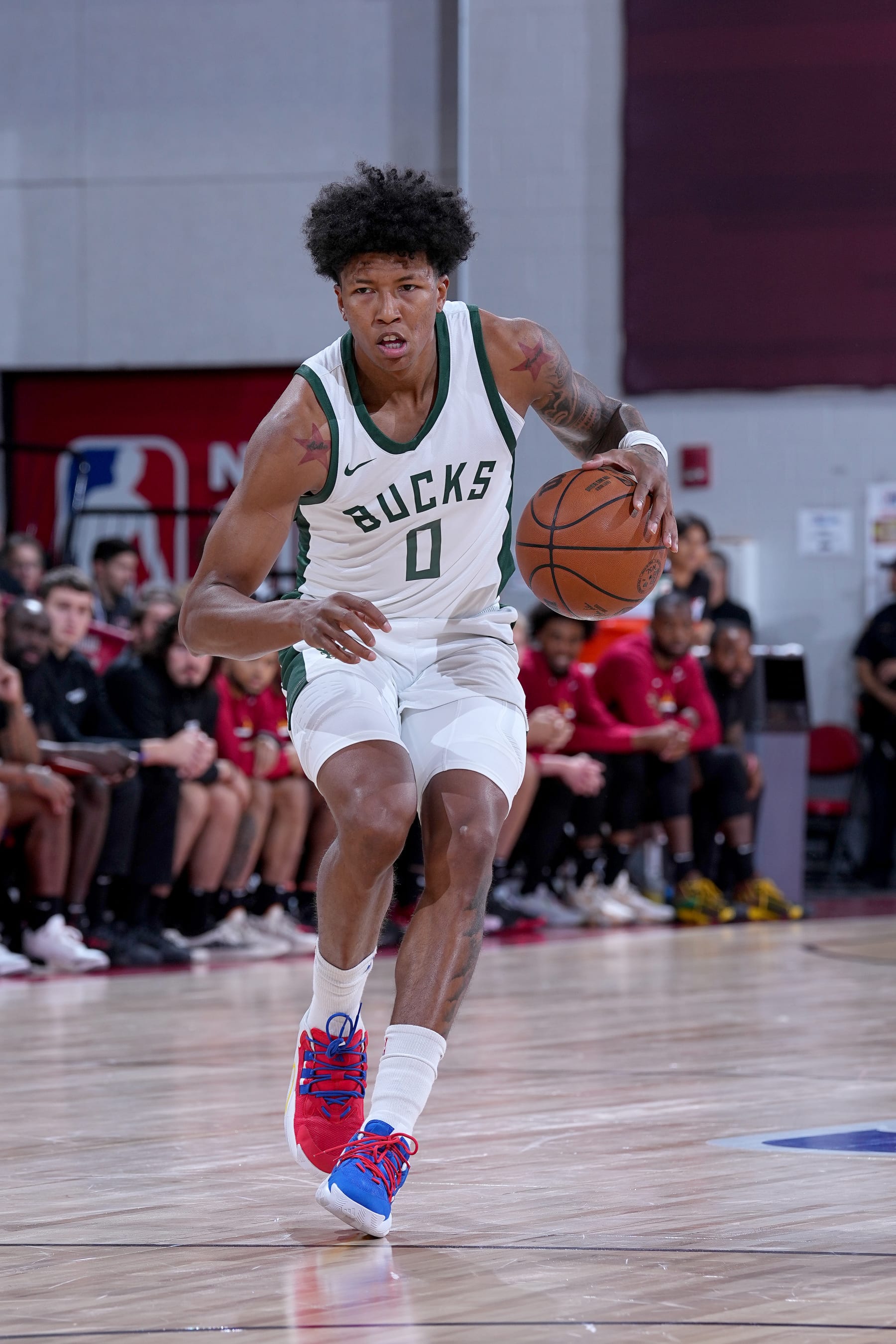 LAS VEGAS, NV - JULY 13: MarJon Beauchamp #0 of Milwuakee Bucks dribbles the ball during the 2023 NBA Las Vegas Summer League on July 13, 2023 at the Cox Pavilion in Las Vegas, Nevada. NOTE TO USER: User expressly acknowledges and agrees that, by downloading and or using this photograph, User is consenting to the terms and conditions of the Getty Images License Agreement. Mandatory Copyright Notice: Copyright 2023 NBAE (Photo by Bart Young/NBAE via Getty Images)