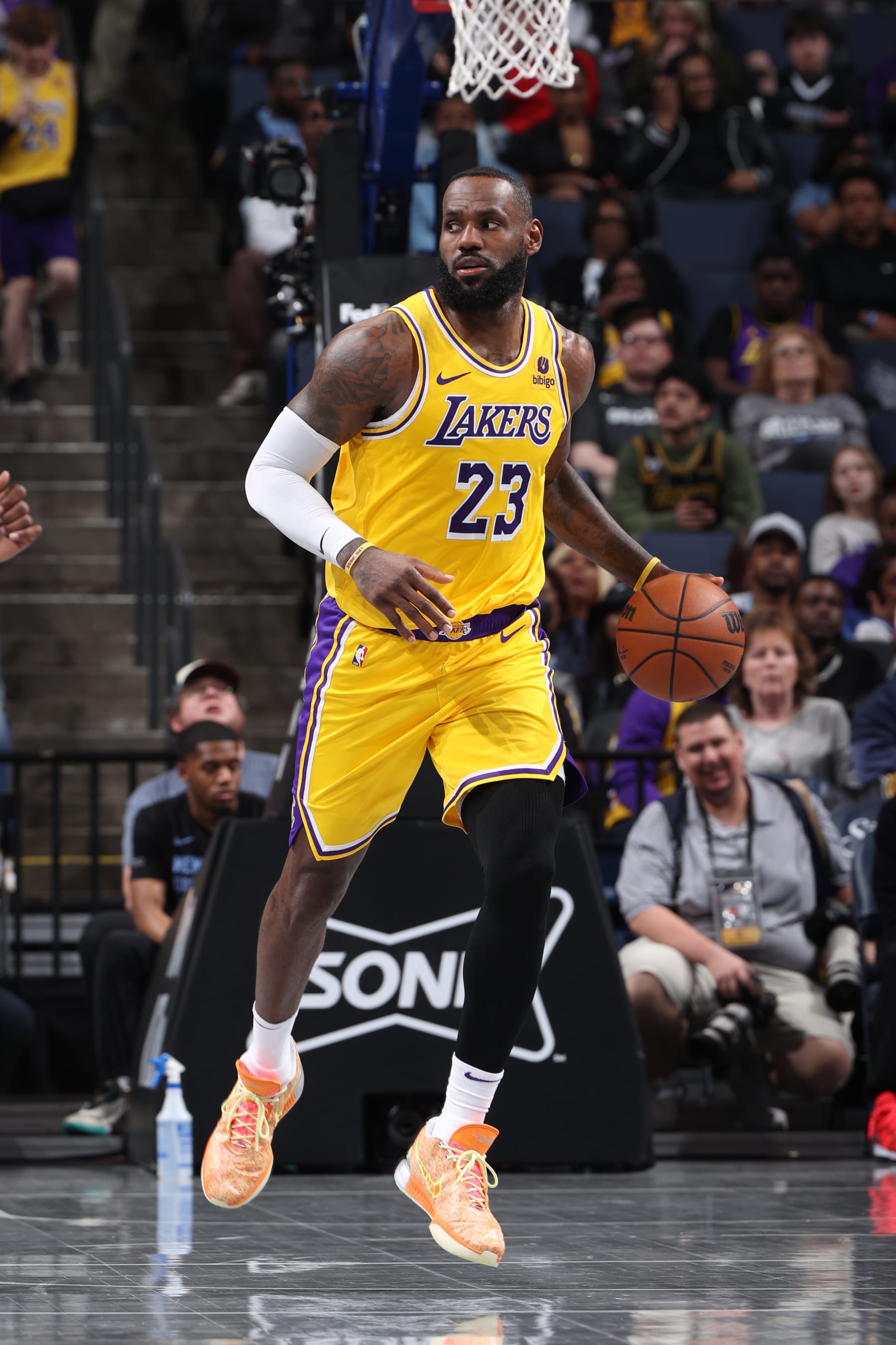 MEMPHIS, TN - MARCH 27: LeBron James #23 of the Los Angeles Lakers handles the ball during the game against the Memphis Grizzlies on March 27, 2024 at FedExForum in Memphis, Tennessee. NOTE TO USER: User expressly acknowledges and agrees that, by downloading and or using this photograph, User is consenting to the terms and conditions of the Getty Images License Agreement. Mandatory Copyright Notice: Copyright 2024 NBAE (Photo by Joe Murphy/NBAE via Getty Images)
