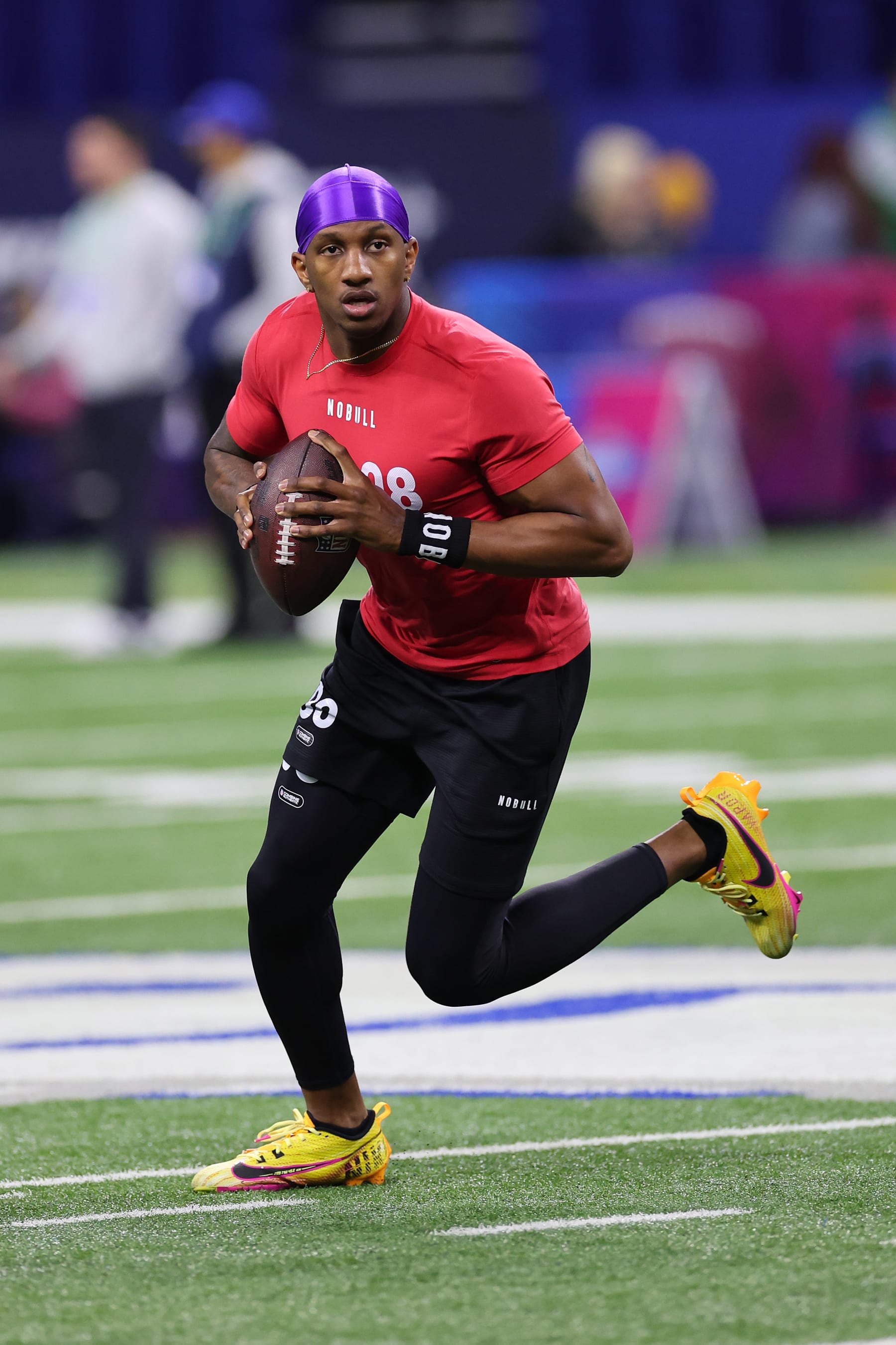 INDIANAPOLIS, INDIANA - MARCH 02: Michael Penix #QB08 of Washington participates in a drill during the NFL Combine at Lucas Oil Stadium on March 02, 2024 in Indianapolis, Indiana. (Photo by Stacy Revere/Getty Images)