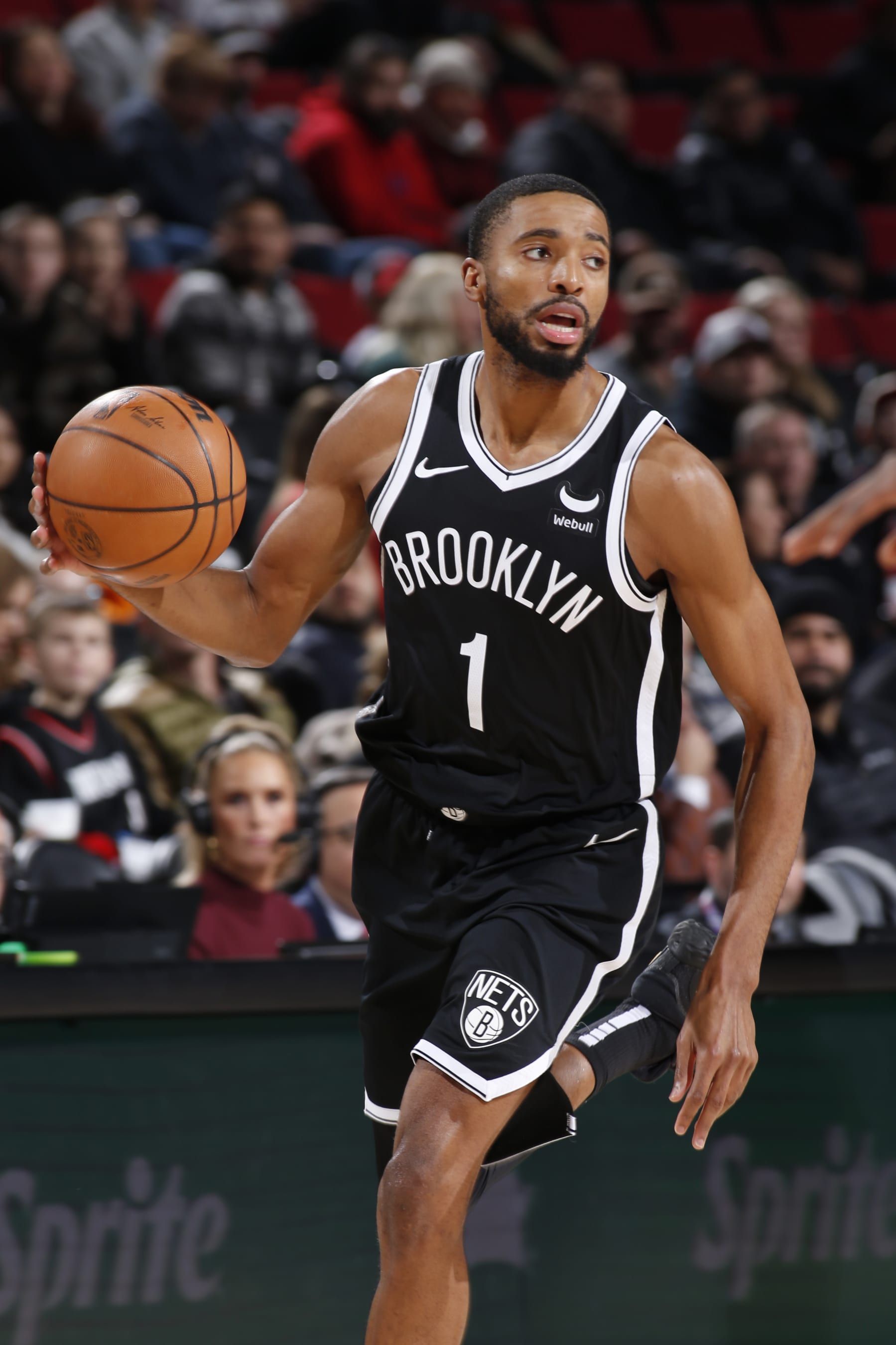 PORTLAND, OR - JANUARY 17: Mikal Bridges #1 of the Brooklyn Nets dribbles the ball during the game against the Portland Trail Blazers on January 17, 2024 at the Moda Center Arena in Portland, Oregon. NOTE TO USER: User expressly acknowledges and agrees that, by downloading and or using this photograph, user is consenting to the terms and conditions of the Getty Images License Agreement. Mandatory Copyright Notice: Copyright 2024 NBAE (Photo by Cameron Browne/NBAE via Getty Images)