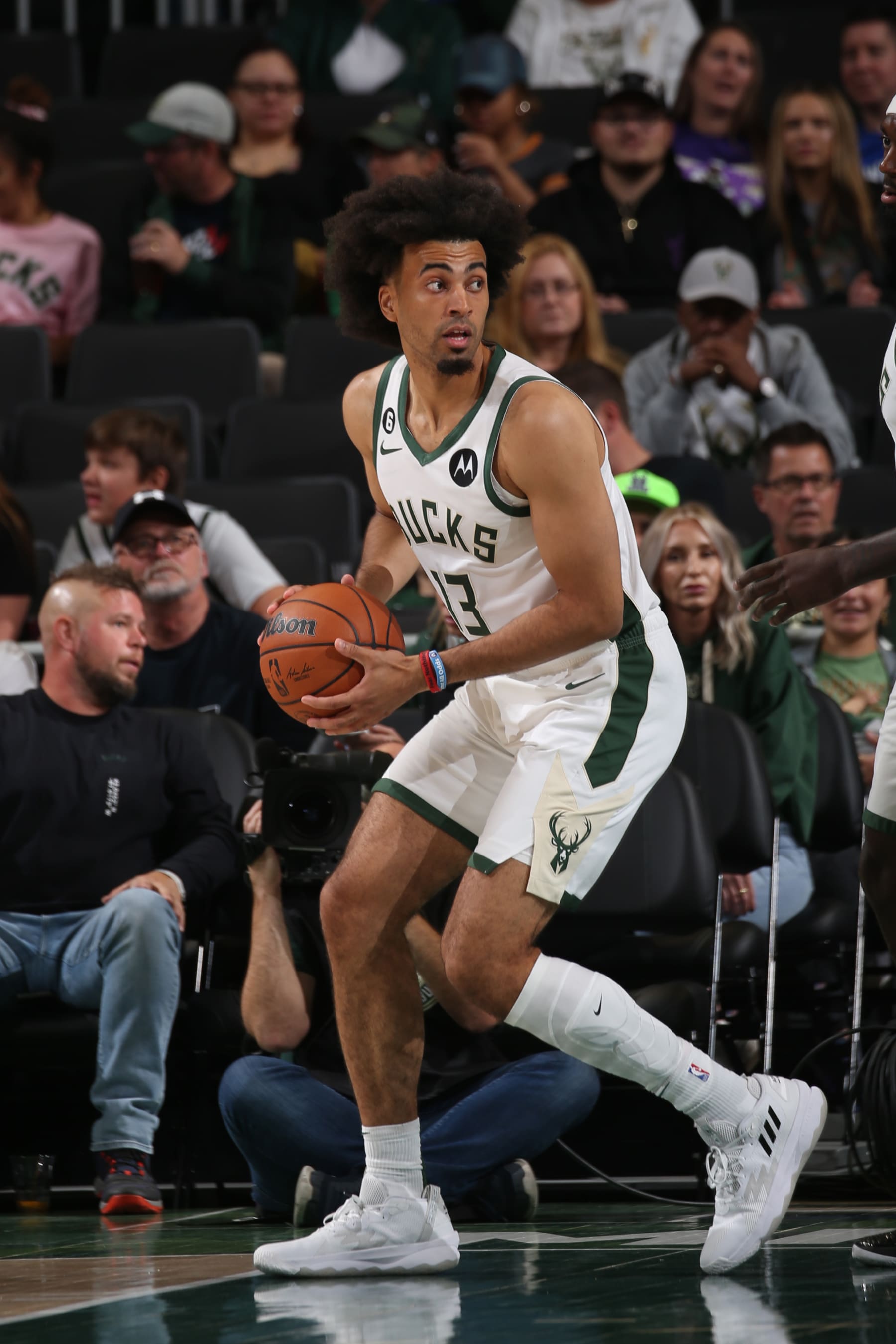 MILWAUKEE, WI - OCTOBER 1: Jordan Nwora #13 of the Milwaukee Bucks handles the ball during a preseason game against the Memphis Grizzlies on October 1, 2022 at the Fiserv Forum Center in Milwaukee, Wisconsin. NOTE TO USER: User expressly acknowledges and agrees that, by downloading and or using this Photograph, user is consenting to the terms and conditions of the Getty Images License Agreement. Mandatory Copyright Notice: Copyright 2022 NBAE (Photo by Gary Dineen/NBAE via Getty Images).