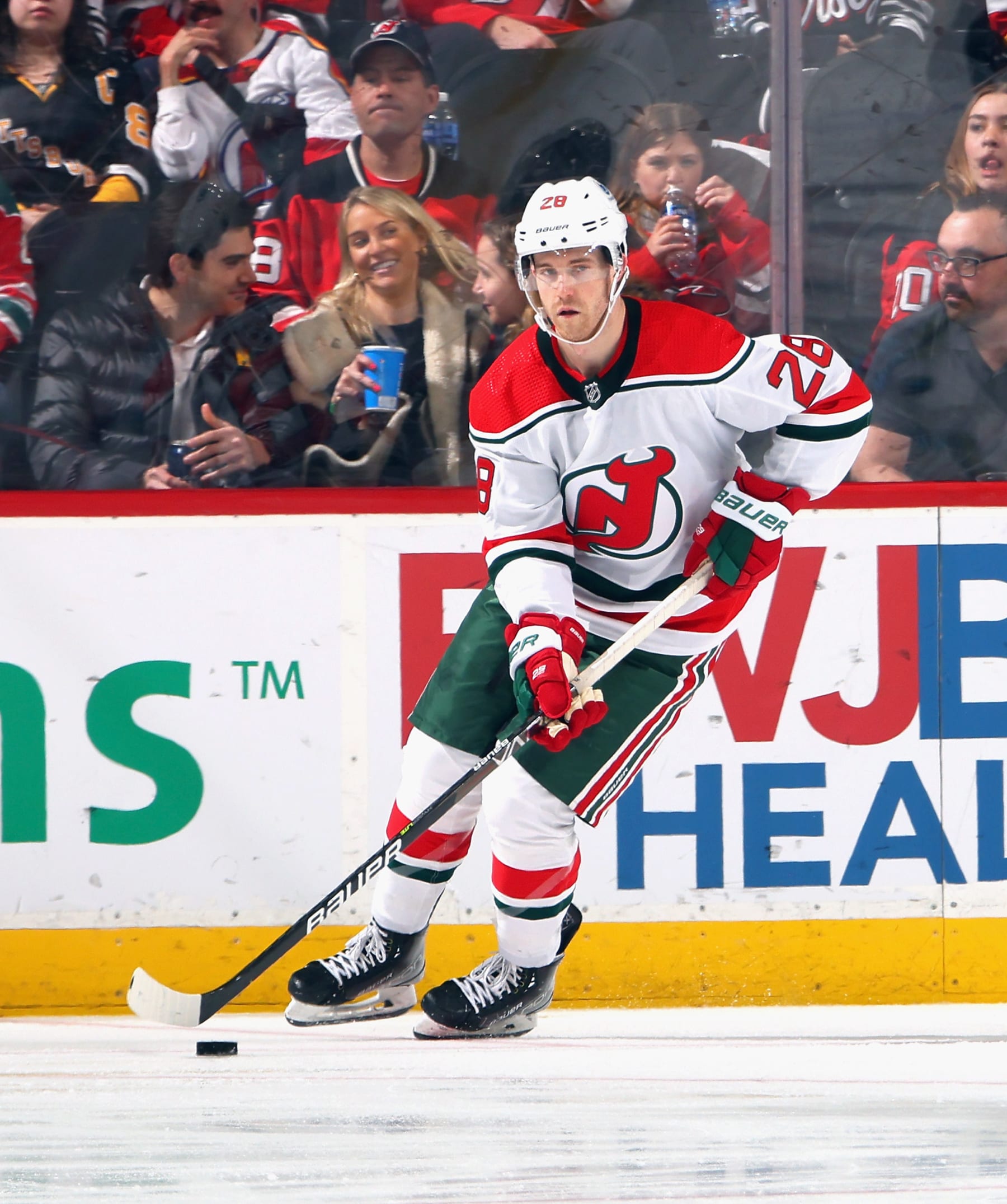 NEWARK, NEW JERSEY - APRIL 04: Damon Severson #28 of the New Jersey Devils skates against the Pittsburgh Penguins at Prudential Center on April 04, 2023 in Newark, New Jersey. (Photo by Bruce Bennett/Getty Images)