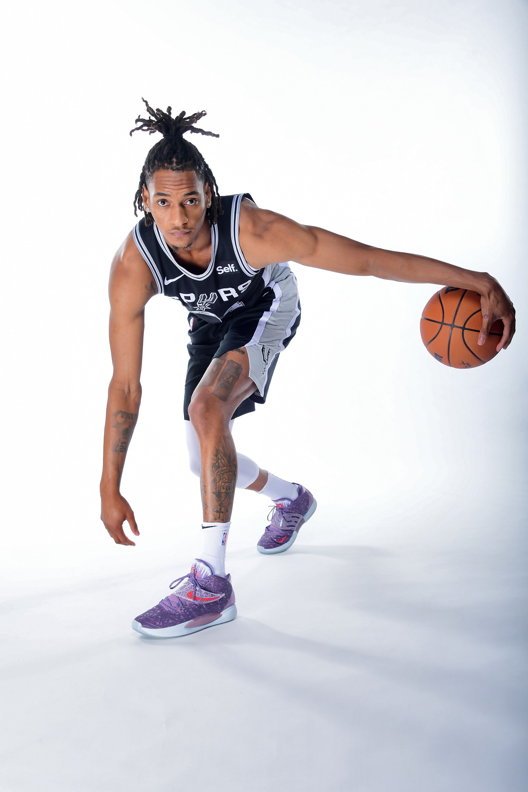 SAN ANTONIO, TX - OCTOBER 2: Devin Vassell #24 of the San Antonio Spurs poses for a portrait during 2023-24 NBA Media Day on October 2, 2023 at the Frost Bank Center in San Antonio, Texas. NOTE TO USER: User expressly acknowledges and agrees that, by downloading and or using this photograph, user is consenting to the terms and conditions of the Getty Images License Agreement. Mandatory Copyright Notice: Copyright 2023 NBAE (Photos by Michael Gonzales/NBAE via Getty Images)
