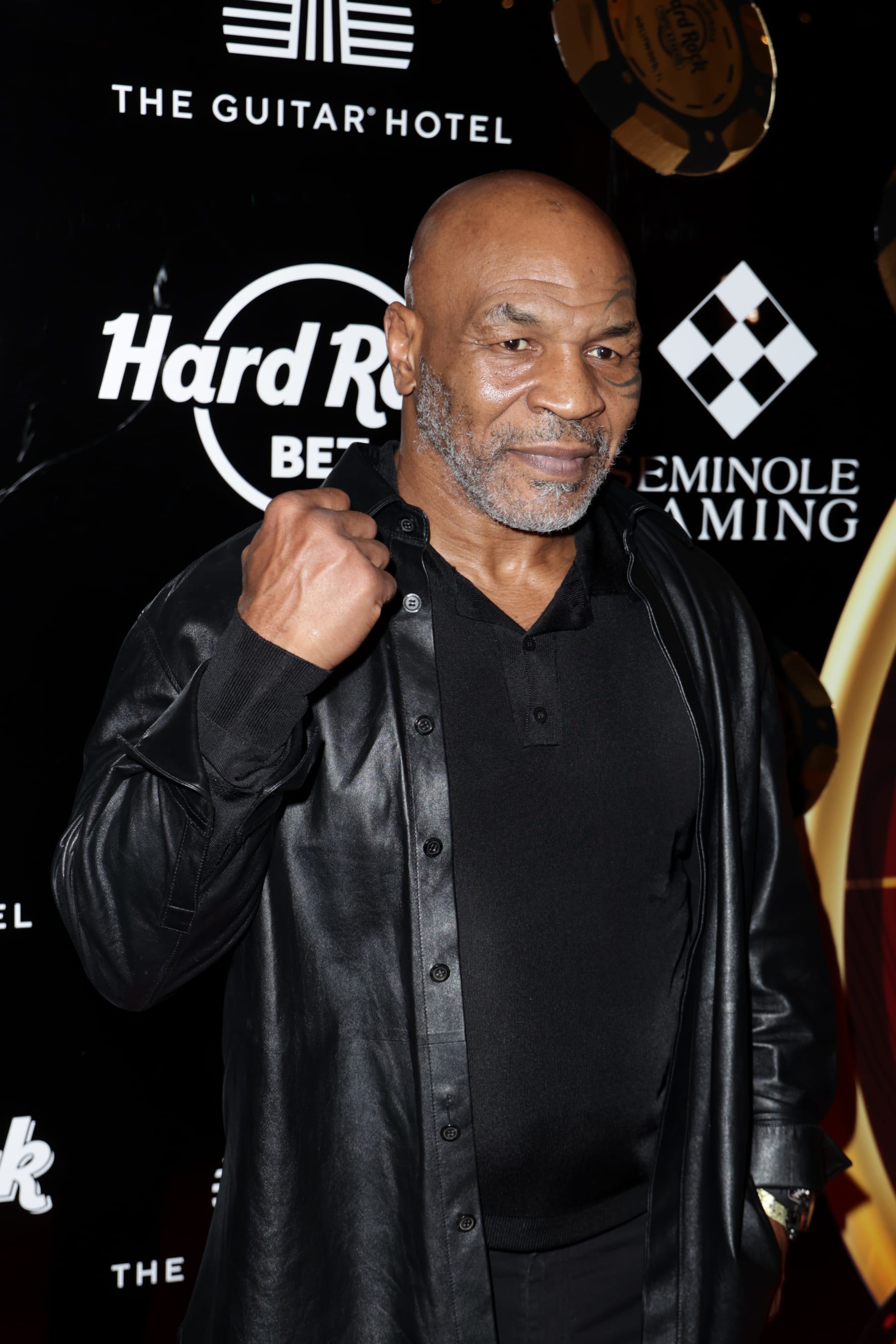 HOLLYWOOD, FLORIDA - DECEMBER 07: Mike Tyson attends the star-studded launch party for official debut of craps, roulette and sports betting in the state of Florida at The Guitar Hotel at Seminole Hard Rock Hotel & Casino Hollywood on December 07, 2023 in Hollywood, Florida. (Photo by John Parra/Getty Images for Seminole Hard Rock Hotel & Casino Hollywood)