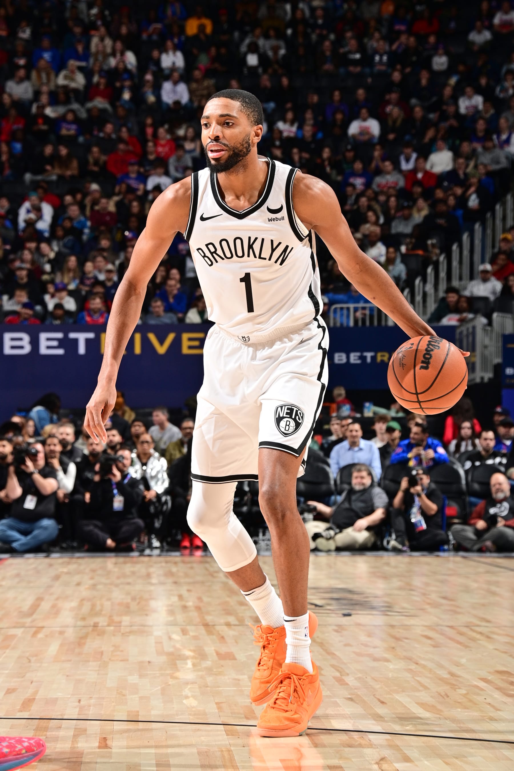 DETROIT, MI - DECEMBER 26: Mikal Bridges #1 of the Brooklyn Nets dribbles the ball during the game against the Detroit Pistons on December 26, 2023 at Little Caesars Arena in Detroit, Michigan. NOTE TO USER: User expressly acknowledges and agrees that, by downloading and/or using this photograph, User is consenting to the terms and conditions of the Getty Images License Agreement. Mandatory Copyright Notice: Copyright 2023 NBAE (Photo by Chris Schwegler/NBAE via Getty Images)