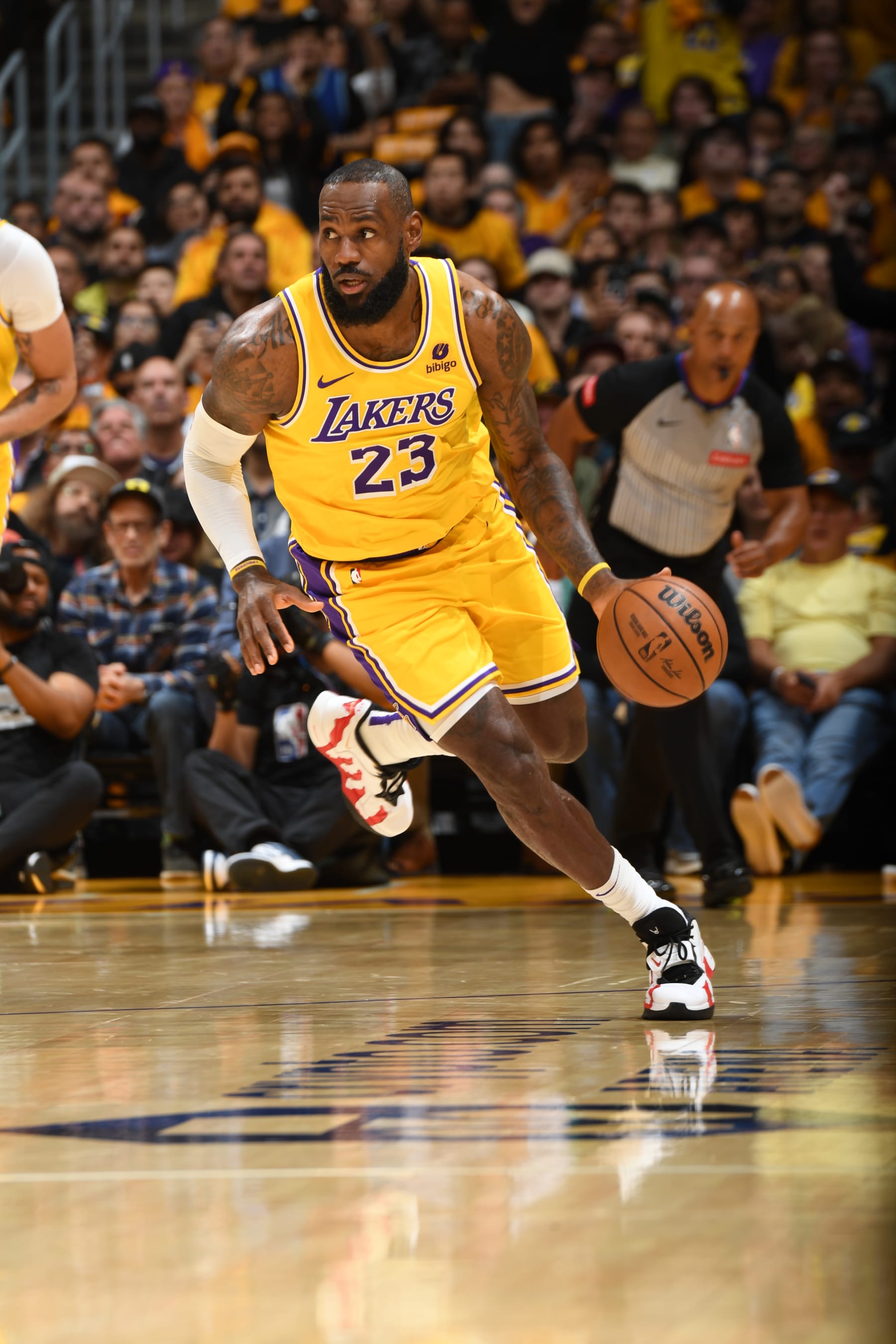 LOS ANGELES, CA - APRIL 25: LeBron James #23 of the Los Angeles Lakers dribbles the ball during the game against the Denver Nuggets during Round 1 Game 3 of the 2024 NBA Playoffs on April 25, 2024 at Crypto.Com Arena in Los Angeles, California. NOTE TO USER: User expressly acknowledges and agrees that, by downloading and/or using this Photograph, user is consenting to the terms and conditions of the Getty Images License Agreement. Mandatory Copyright Notice: Copyright 2024 NBAE (Photo by Andrew D. Bernstein/NBAE via Getty Images)