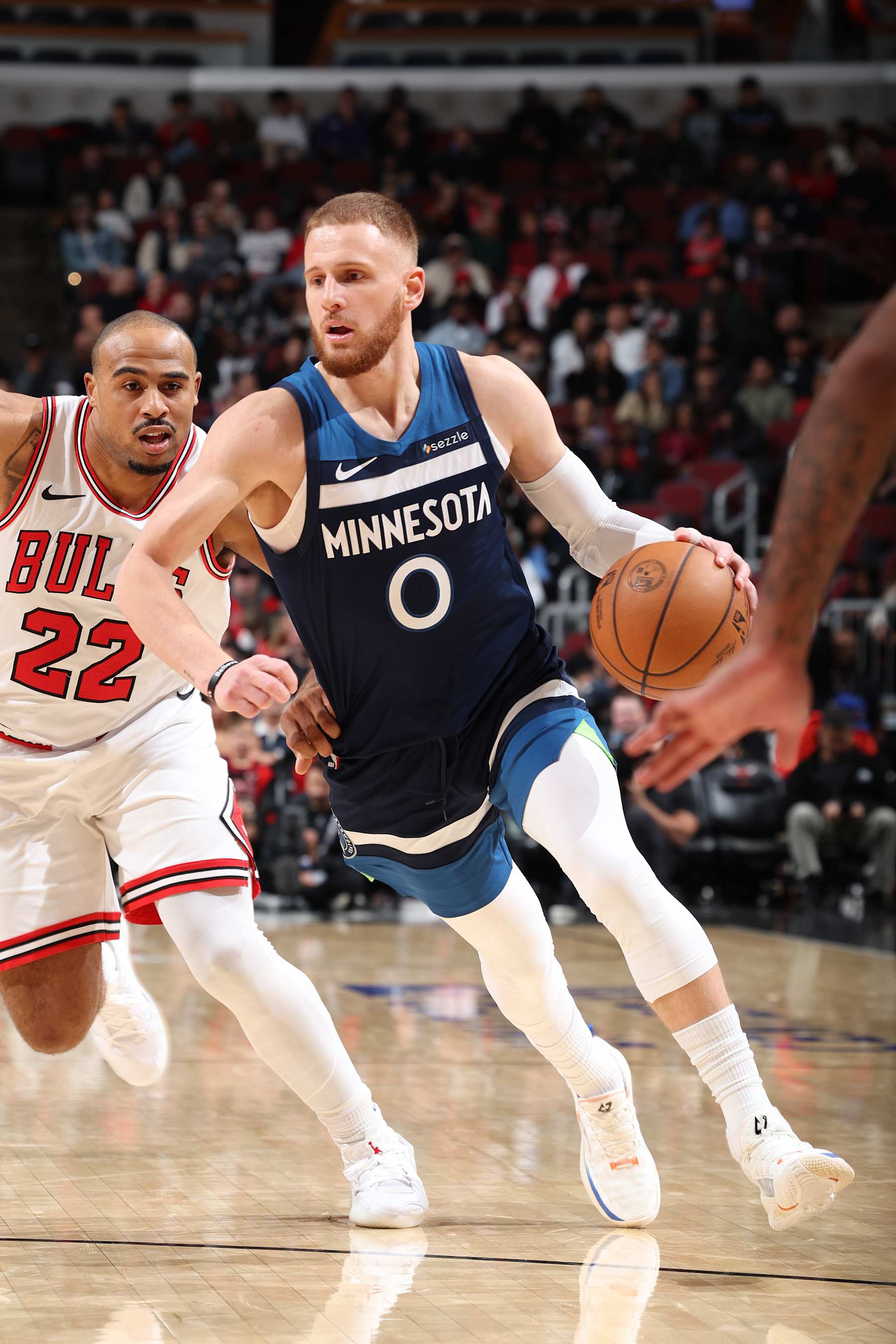 CHICAGO, IL - OCTOBER 16: Donte DiVincenzo #0 of the Minnesota Timberwolves dribbles the ball during the game against the Chicago Bulls during a NBA pre season game on October 16, 2024 at United Center in Chicago, Illinois. NOTE TO USER: User expressly acknowledges and agrees that, by downloading and or using this photograph, User is consenting to the terms and conditions of the Getty Images License Agreement. Mandatory Copyright Notice: Copyright 2024 NBAE (Photo by Jeff Haynes/NBAE via Getty Images)