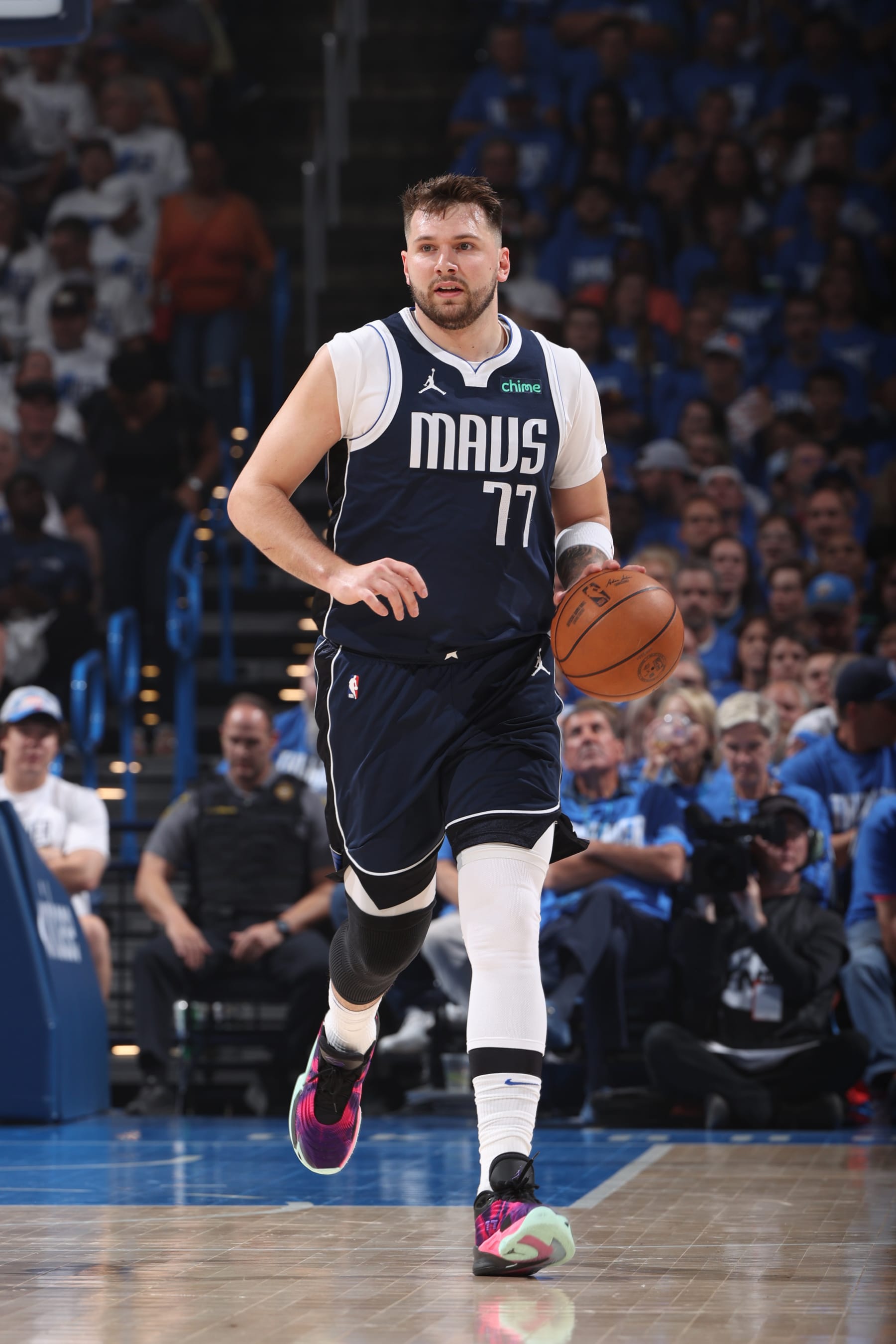 OKLAHOMA CITY, OK - MAY 7: Luka Doncic #77 of the Dallas Mavericks dribbles the ball during the game against the Oklahoma City Thunder during Round 2 Game 1 of the 2024 NBA Playoffs on May 7, 2024 at Paycom Arena in Oklahoma City, Oklahoma. NOTE TO USER: User expressly acknowledges and agrees that, by downloading and or using this photograph, User is consenting to the terms and conditions of the Getty Images License Agreement. Mandatory Copyright Notice: Copyright 2024 NBAE (Photo by Joe Murphy/NBAE via Getty Images)