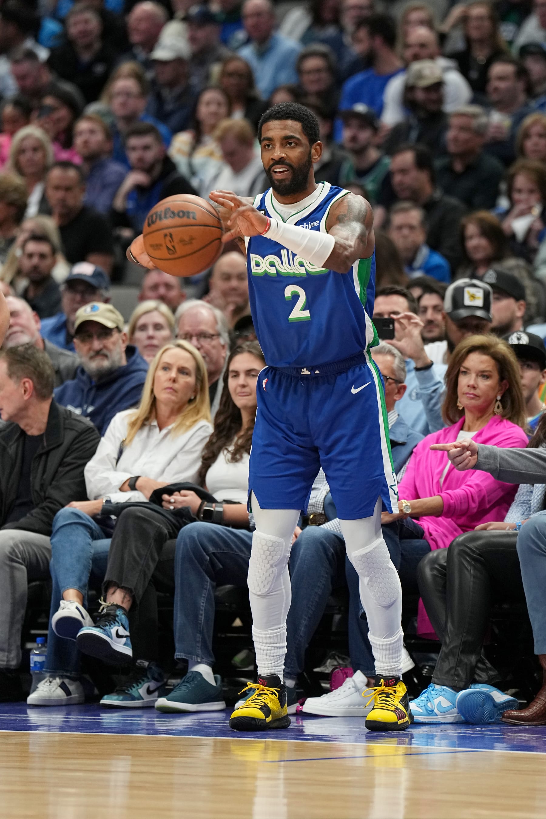 DALLAS, TX - FEBRUARY 13: Kyrie Irving #2 of the Dallas Mavericks passes the ball during the game against the Minnesota Timberwolves on February 13, 2023 at the American Airlines Center in Dallas, Texas. NOTE TO USER: User expressly acknowledges and agrees that, by downloading and or using this photograph, User is consenting to the terms and conditions of the Getty Images License Agreement. Mandatory Copyright Notice: Copyright 2023 NBAE (Photo by Glenn James/NBAE via Getty Images)