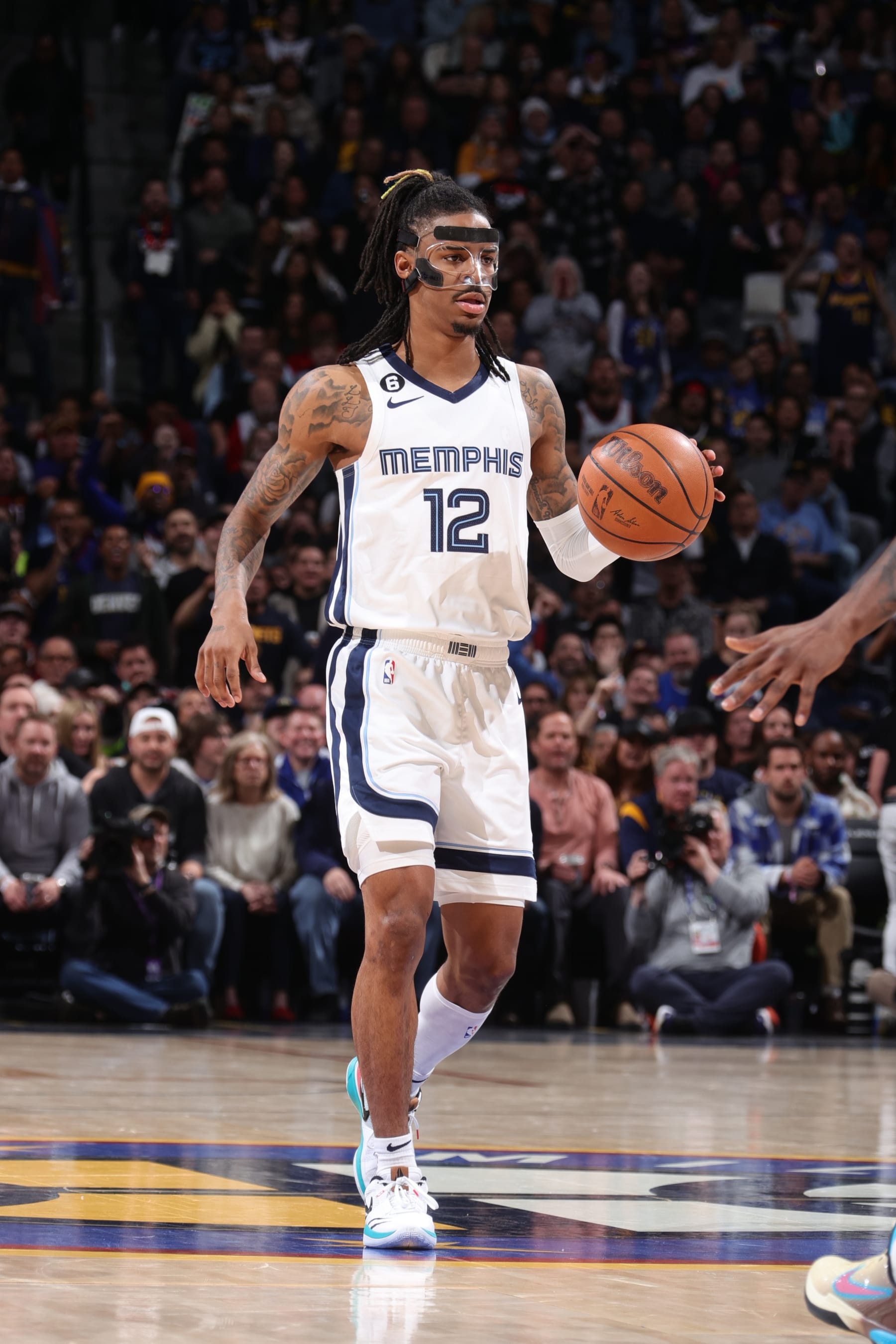 DENVER, CO - MARCH 3: Ja Morant #12 of the Memphis Grizzlies dribbles the ball during the game against the Denver Nuggets on March 3, 2023 at the Ball Arena in Denver, Colorado. NOTE TO USER: User expressly acknowledges and agrees that, by downloading and/or using this Photograph, user is consenting to the terms and conditions of the Getty Images License Agreement. Mandatory Copyright Notice: Copyright 2023 NBAE (Photo by Nathaniel S. Butler/NBAE via Getty Images)