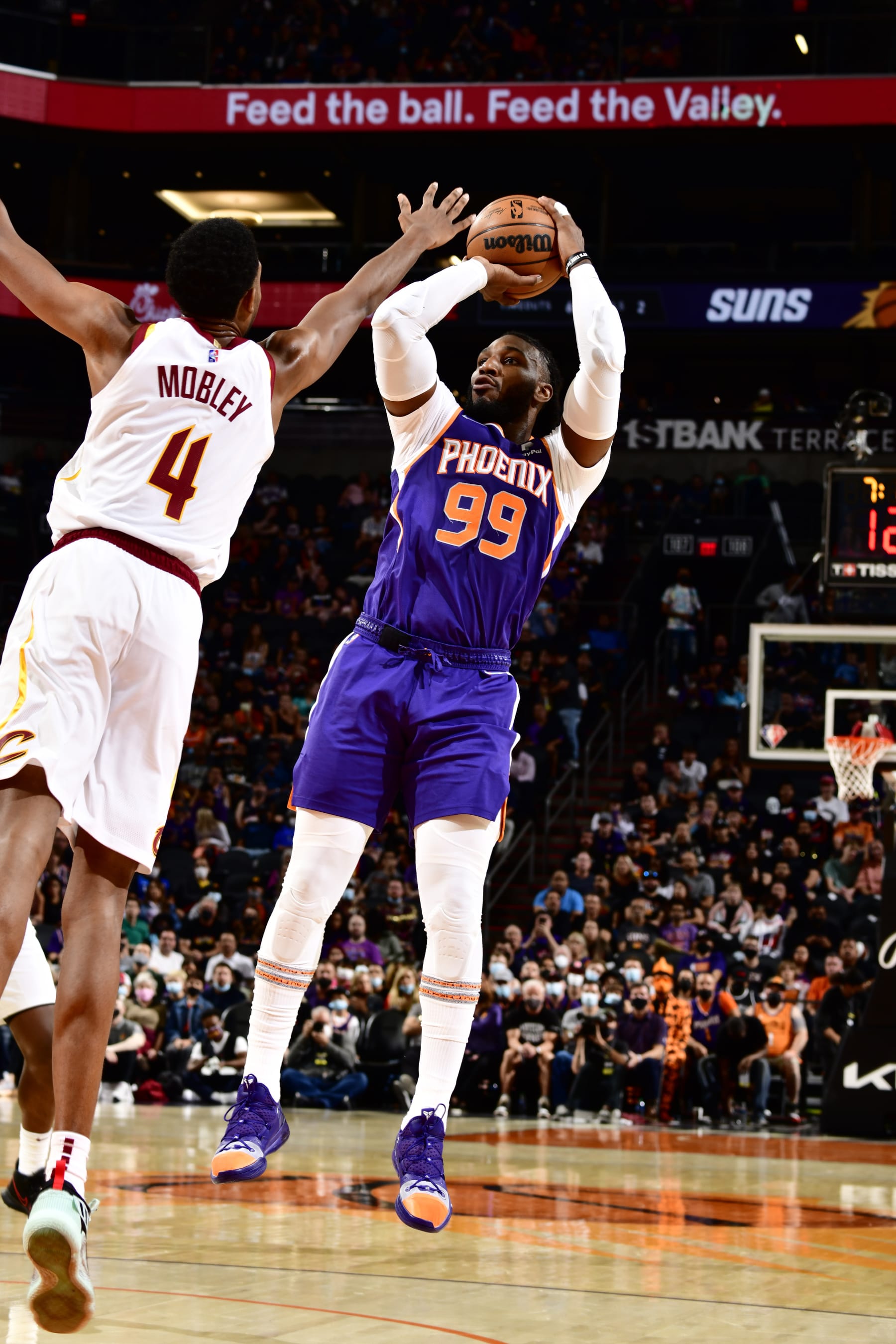 PHOENIX, AZ - OCTOBER 30: Jae Crowder #99 of the Phoenix Suns shoots the ball against the Cleveland Cavaliers on October 30, 2021 at Footprint Center in Phoenix, Arizona. NOTE TO USER: User expressly acknowledges and agrees that, by downloading and or using this photograph, user is consenting to the terms and conditions of the Getty Images License Agreement. Mandatory Copyright Notice: Copyright 2021 NBAE (Photo by Barry Gossage/NBAE via Getty Images)