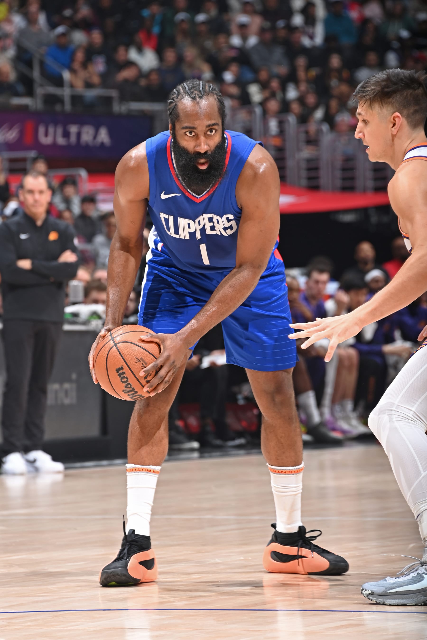 LOS ANGELES, CA - JANUARY 8: James Harden #1 of the LA Clippers handles the ball during the game against the Phoenix Suns on January 8, 2024 at Crypto.Com Arena in Los Angeles, California. NOTE TO USER: User expressly acknowledges and agrees that, by downloading and/or using this Photograph, user is consenting to the terms and conditions of the Getty Images License Agreement. Mandatory Copyright Notice: Copyright 2024 NBAE (Photo by Andrew D. Bernstein/NBAE via Getty Images)