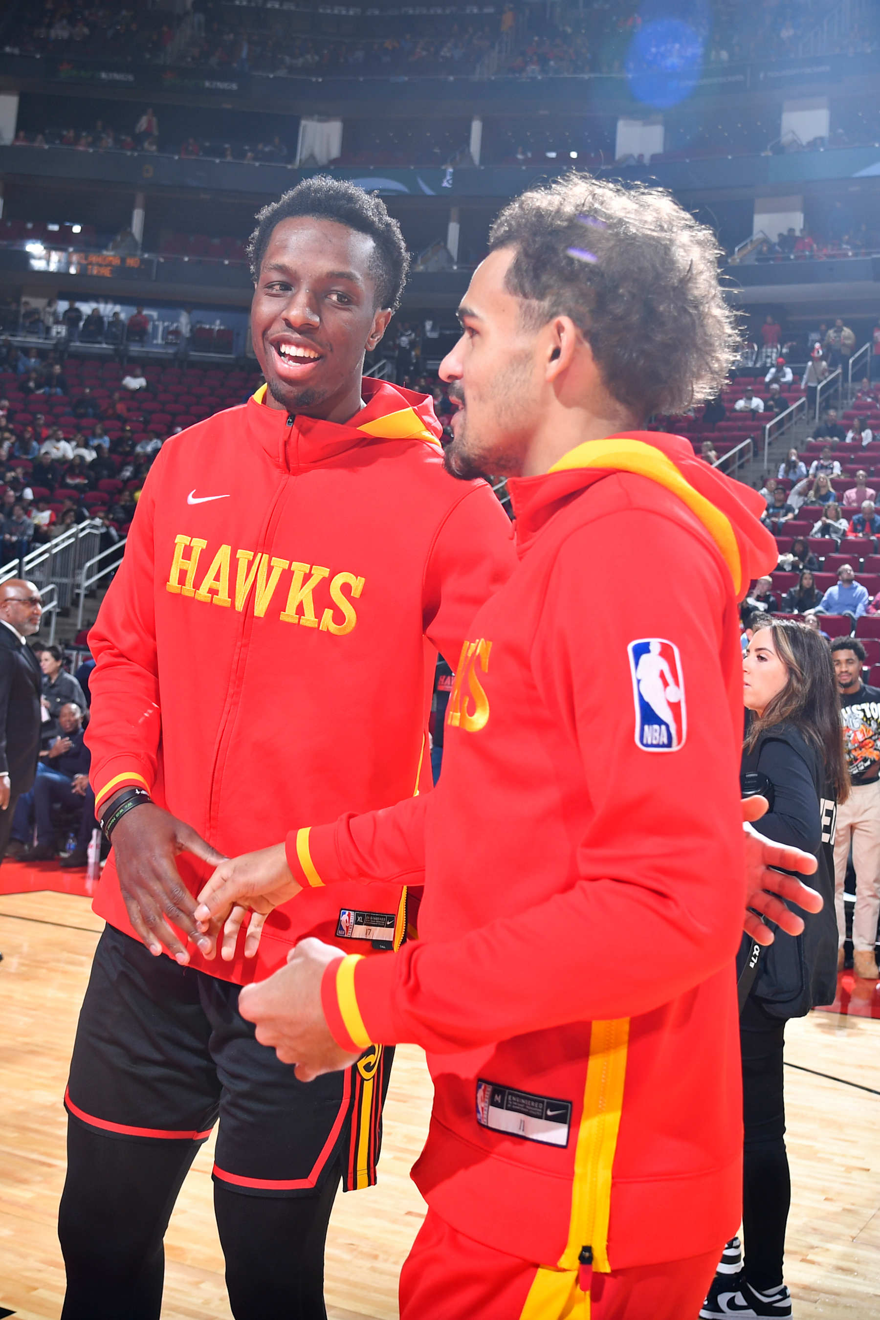 HOUSTON, TX - NOVEMBER 25:   Onyeka Okongwu #17 and Trae Young #11 of the Atlanta Hawks looks on before the game against the Houston Rockets on November 25, 2022 at the Toyota Center in Houston, Texas. NOTE TO USER: User expressly acknowledges and agrees that, by downloading and or using this photograph, User is consenting to the terms and conditions of the Getty Images License Agreement. Mandatory Copyright Notice: Copyright 2022 NBAE (Photo by Logan Riely/NBAE via Getty Images)
