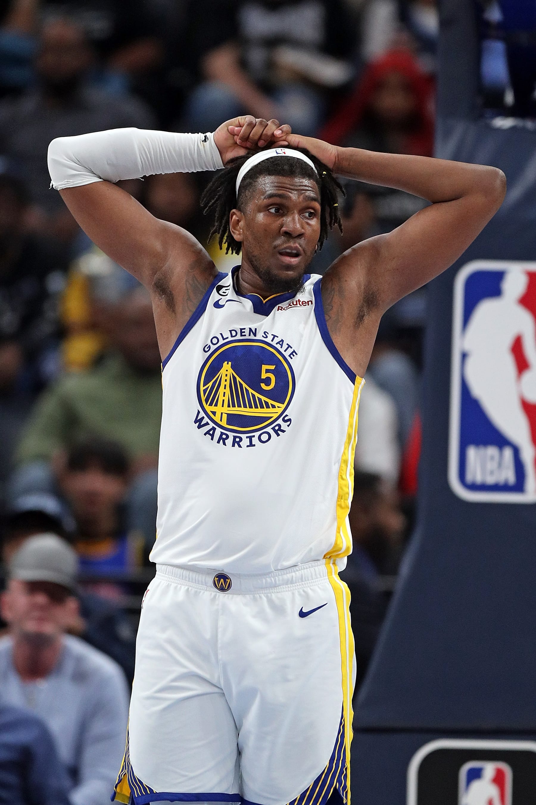 MEMPHIS, TENNESSEE - MARCH 09: Kevon Looney #5 of the Golden State Warriors looks on during the game against the Memphis Grizzlies at FedExForum on March 09, 2023 in Memphis, Tennessee. NOTE TO USER: User expressly acknowledges and agrees that, by downloading and or using this photograph, User is consenting to the terms and conditions of the Getty Images License Agreement. (Photo by Justin Ford/Getty Images)