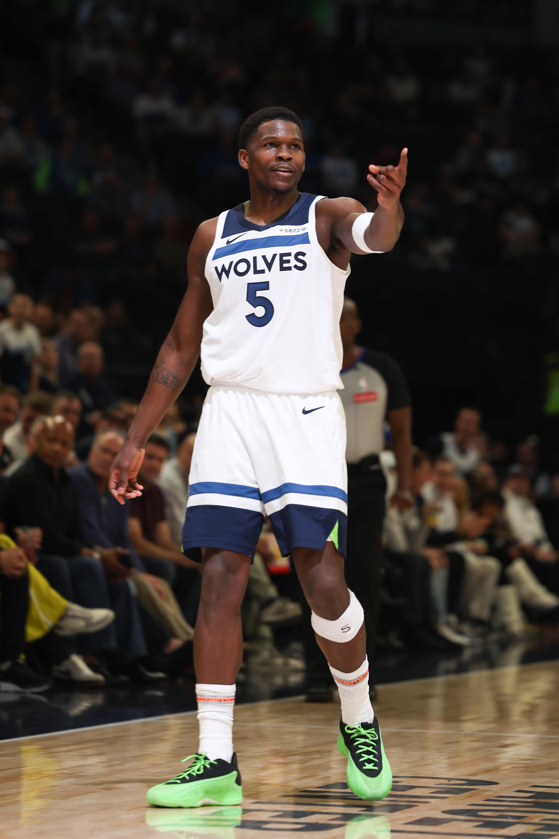 MINNEAPOLIS, MN -  OCTOBER 29: Anthony Edwards #5 of the Minnesota Timberwolves looks on during the game against the Dallas Mavericks on October 29, 2024 at Target Center in Minneapolis, Minnesota. NOTE TO USER: User expressly acknowledges and agrees that, by downloading and or using this Photograph, user is consenting to the terms and conditions of the Getty Images License Agreement. Mandatory Copyright Notice: Copyright 2024 NBAE (Photo by David Sherman/NBAE via Getty Images)
