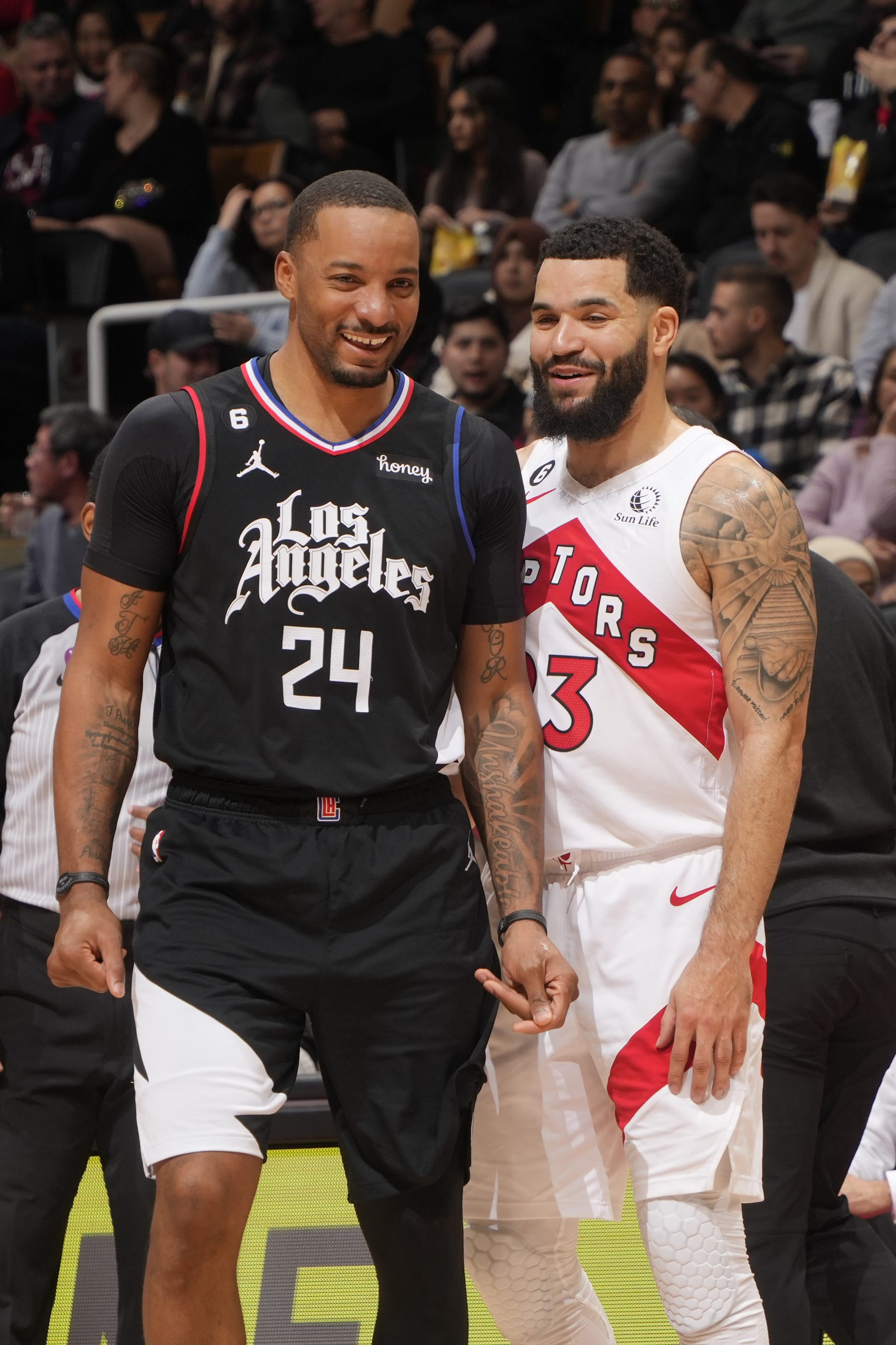 TORONTO, CANADA - DECEMBER 27: Norman Powell #24 of the LA Clippers and Fred VanVleet #23 of the Toronto Raptors talk on December 27, 2022 at the Scotiabank Arena in Toronto, Ontario, Canada.  NOTE TO USER: User expressly acknowledges and agrees that, by downloading and or using this Photograph, user is consenting to the terms and conditions of the Getty Images License Agreement.  Mandatory Copyright Notice: Copyright 2022 NBAE (Photo by Mark Blinch/NBAE via Getty Images)