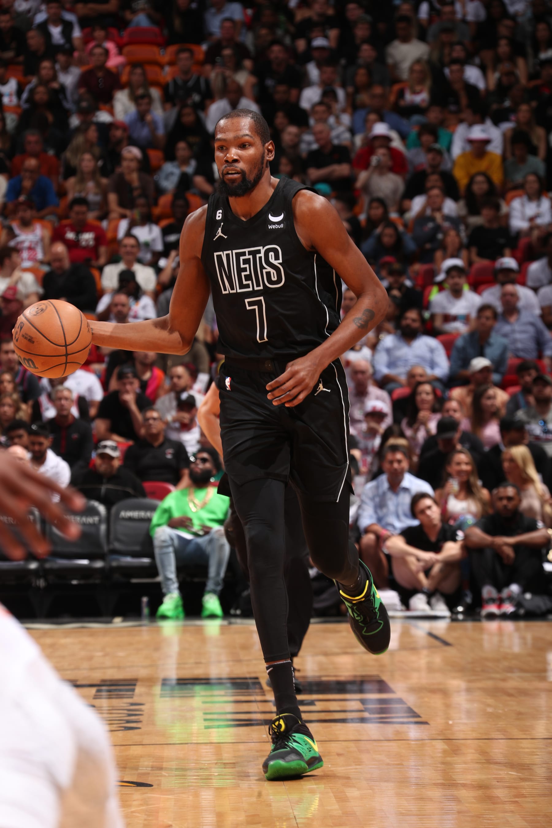 MIAMI, FL - JANUARY 8: Kevin Durant #7 of the Brooklyn Nets dribbles the ball during the game against the Miami Heat on January 8, 2023 at FTX Arena in Miami, Florida. NOTE TO USER: User expressly acknowledges and agrees that, by downloading and or using this Photograph, user is consenting to the terms and conditions of the Getty Images License Agreement. Mandatory Copyright Notice: Copyright 2023 NBAE (Photo by Issac Baldizon/NBAE via Getty Images)
