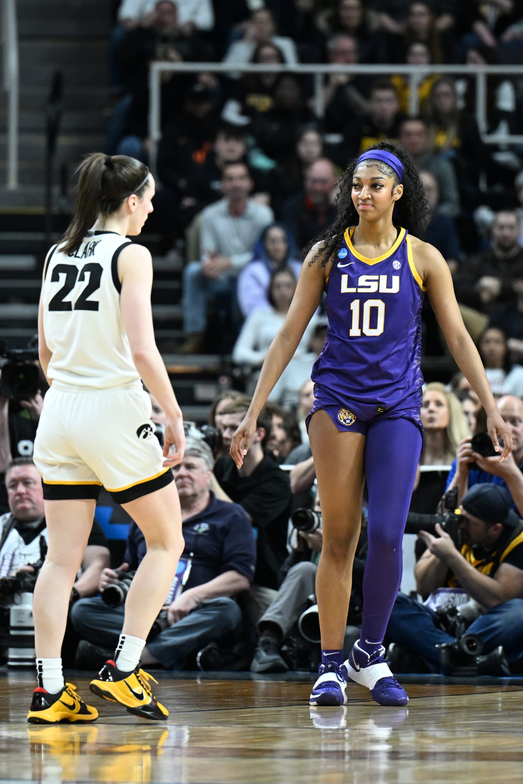 ALBANY, NEW YORK - APRIL 01: Caitlin Clark #22 of the Iowa Hawkeyes and Angel Reese #10 of the LSU Lady Tigers wait for the ball to be inbounded during the Elite Eight round of the 2024 NCAA Women's Basketball Tournament held at MVP Arena on April 1, 2024 in Albany, New York. (Photo by Greg Fiume/NCAA Photos via Getty Images)