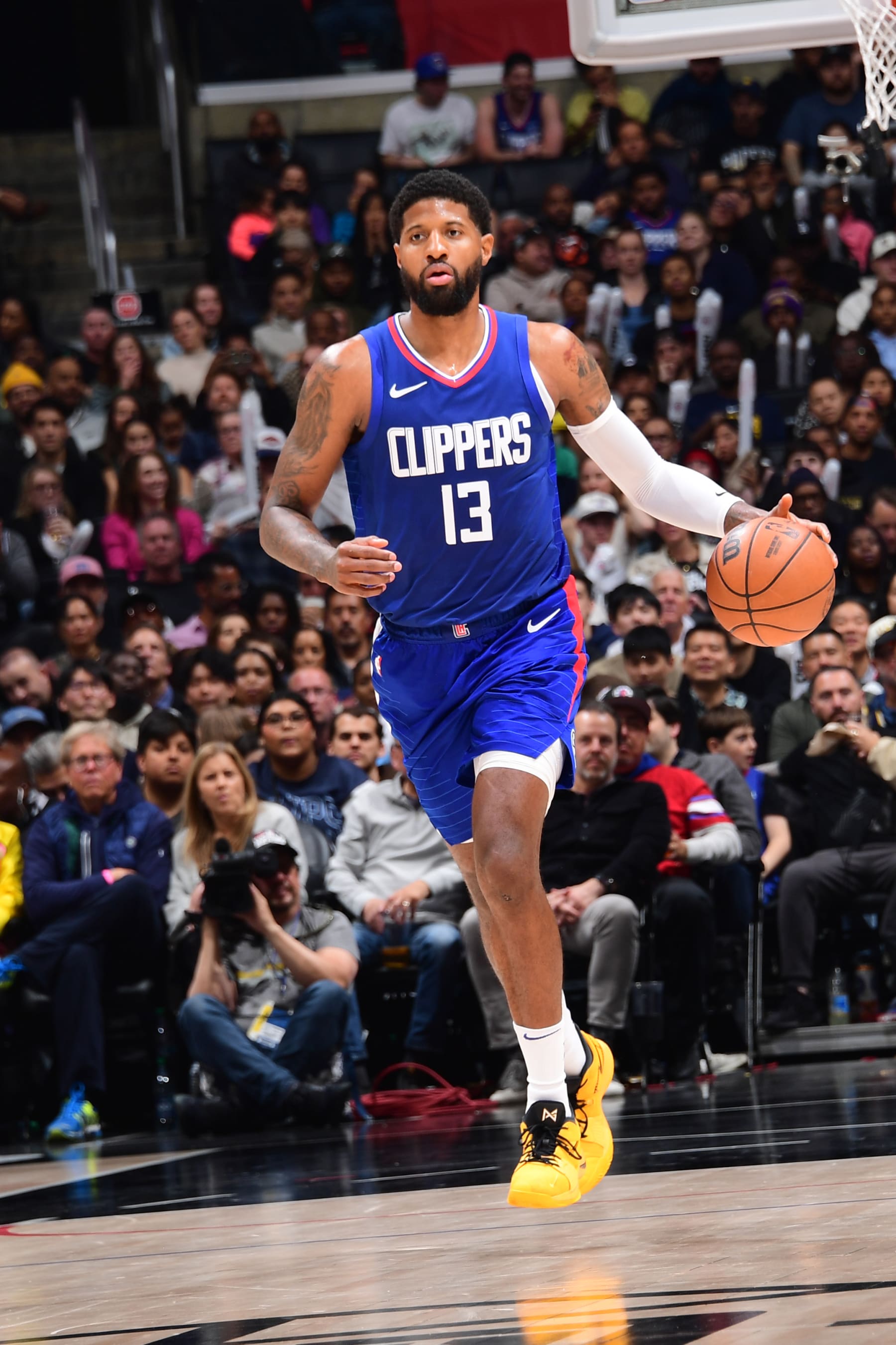 LOS ANGELES, CA - MARCH 25: Paul George #13 of the LA Clippers dribbles the ball during the game against the Indiana Pacers on March 25, 2024 at Crypto.Com Arena in Los Angeles, California. NOTE TO USER: User expressly acknowledges and agrees that, by downloading and/or using this Photograph, user is consenting to the terms and conditions of the Getty Images License Agreement. Mandatory Copyright Notice: Copyright 2024 NBAE (Photo by Adam Pantozzi/NBAE via Getty Images)