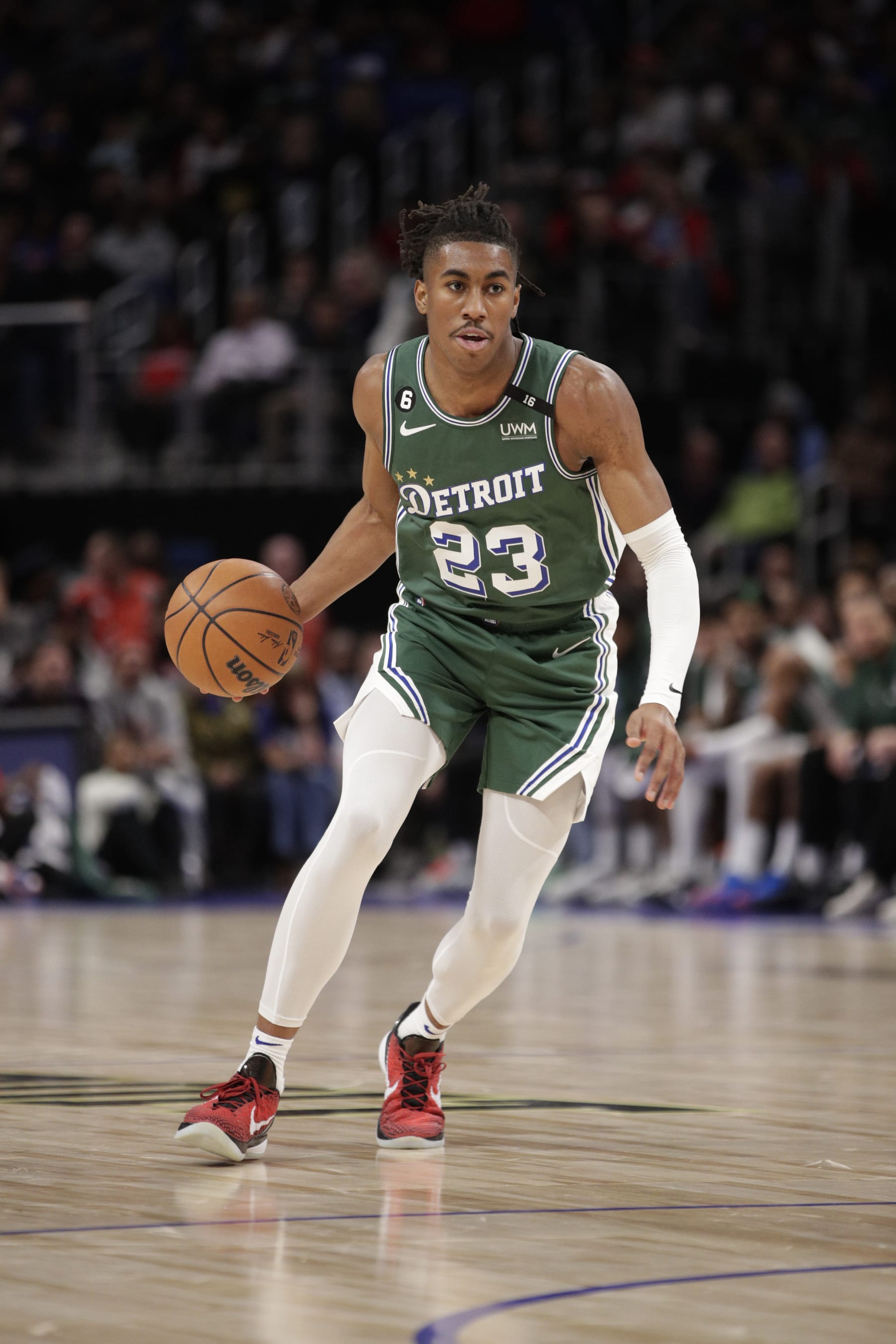 DETROIT, MI - NOVEMBER 14:  Jaden Ivey #23 of the Detroit Pistons handles the ball against the Toronto Raptors on November 14, 2022 at Little Caesars Arena in Detroit, Michigan. NOTE TO USER: User expressly acknowledges and agrees that, by downloading and/or using this photograph, User is consenting to the terms and conditions of the Getty Images License Agreement. Mandatory Copyright Notice: Copyright 2022 NBAE (Photo by Brian Sevald/NBAE via Getty Images)