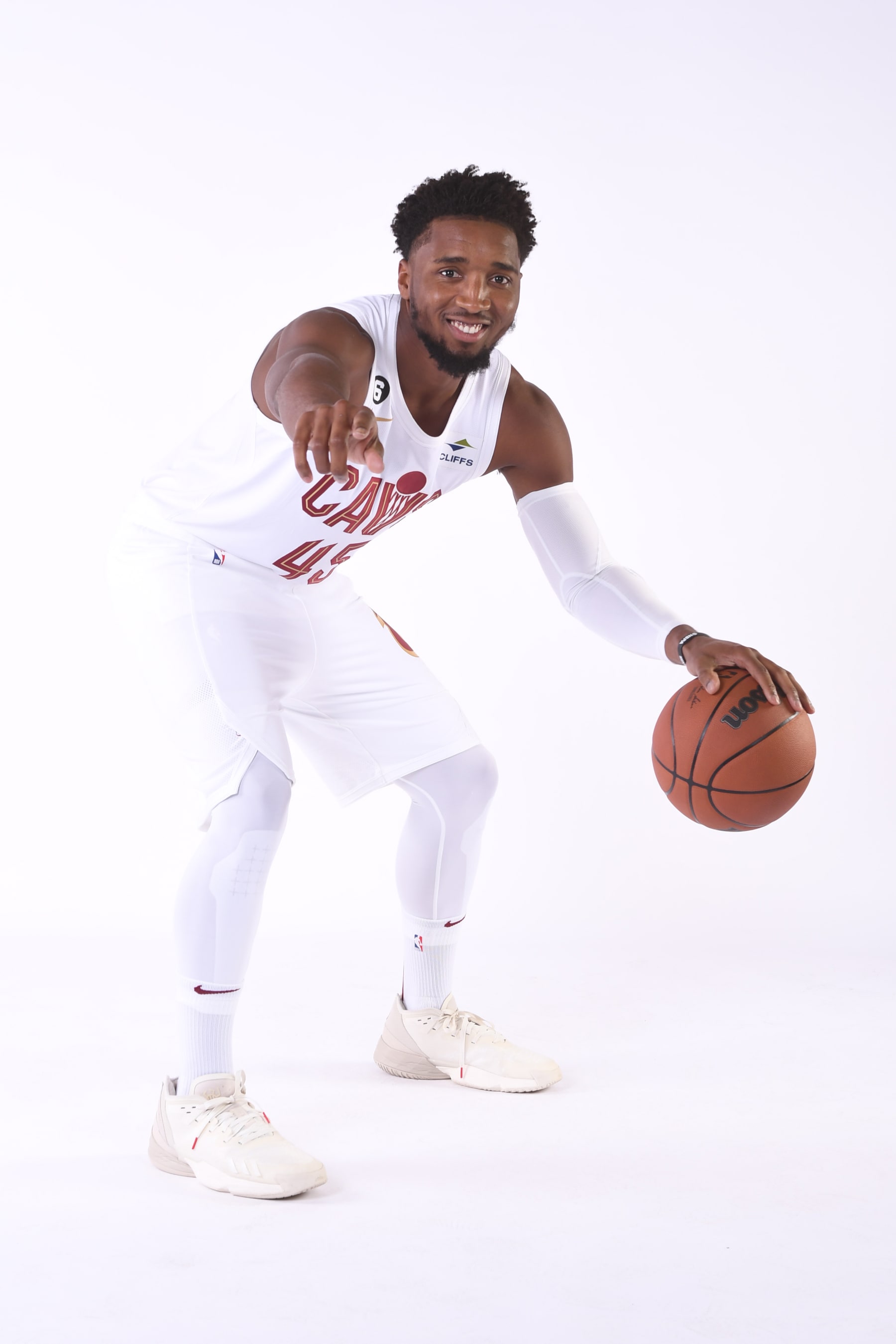 CLEVELAND, OH - SEPTEMBER 26: Donovan Mitchell #45 of the Cleveland Cavaliers poses for a portrait during 2022 NBA Media Day on September 26, 2022 at Rocket Mortgage FieldHouse in Cleveland, Ohio. NOTE TO USER: User expressly acknowledges and agrees that, by downloading and/or using this Photograph, user is consenting to the terms and conditions of the Getty Images License Agreement. Mandatory Copyright Notice: Copyright 2022 NBAE (Photo by Nick Falzerano/NBAE via Getty Images)