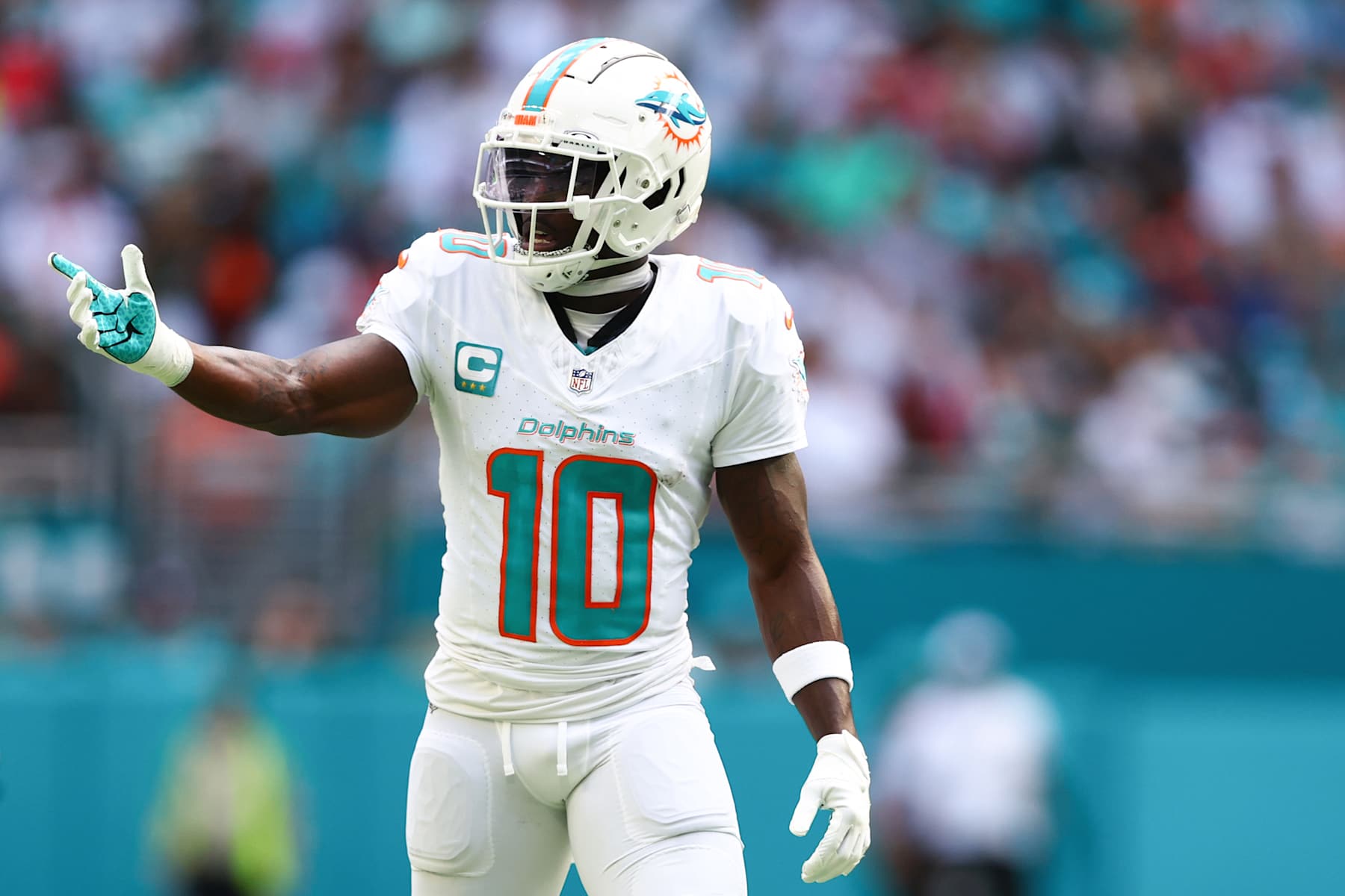 MIAMI GARDENS, FLORIDA - NOVEMBER 24: Tyreek Hill #10 of the Miami Dolphins reacts during the first half of the game against the New England Patriots at Hard Rock Stadium on November 24, 2024 in Miami Gardens, Florida. (Photo by Megan Briggs/Getty Images)