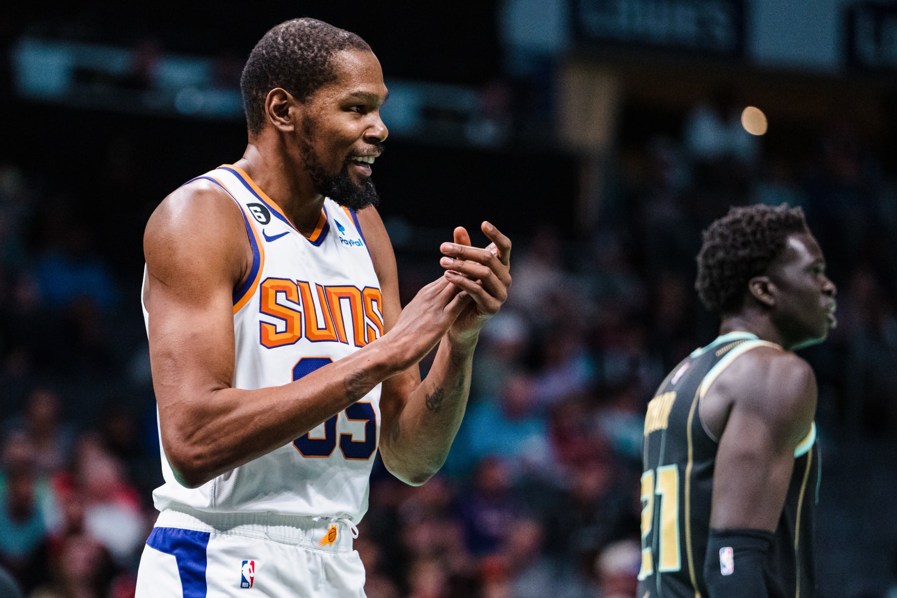 CHARLOTTE, NORTH CAROLINA - MARCH 01: Kevin Durant #35 of the Phoenix Suns reacts in the first quarter during their game against the Charlotte Hornets at Spectrum Center on March 01, 2023 in Charlotte, North Carolina. NOTE TO USER: User expressly acknowledges and agrees that, by downloading and or using this photograph, User is consenting to the terms and conditions of the Getty Images License Agreement. (Photo by Jacob Kupferman/Getty Images)