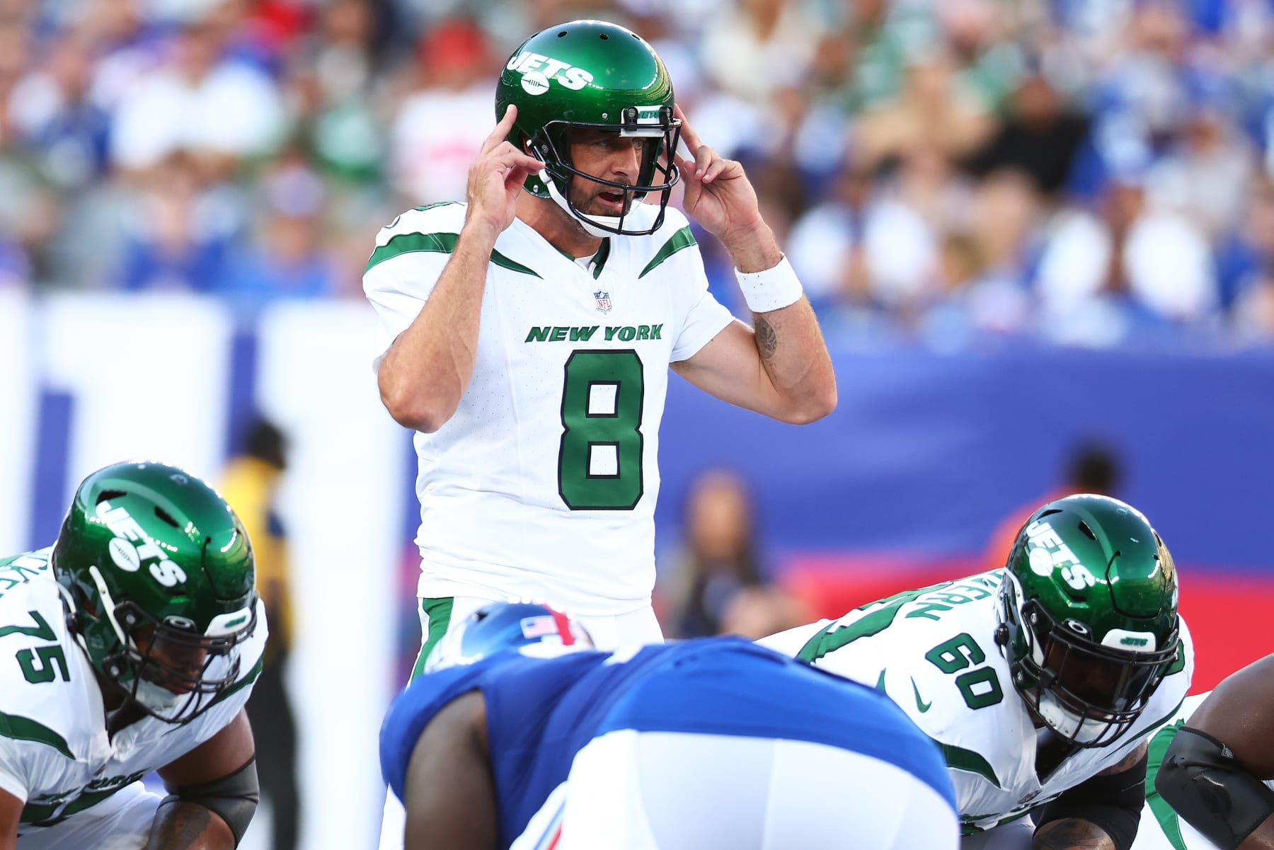 EAST RUTHERFORD, NEW JERSEY - AUGUST 26: Aaron Rodgers #8 of the New York Jets signals against the New York Giants during a preseason game at MetLife Stadium on August 26, 2023 in East Rutherford, New Jersey. (Photo by Mike Stobe/Getty Images)