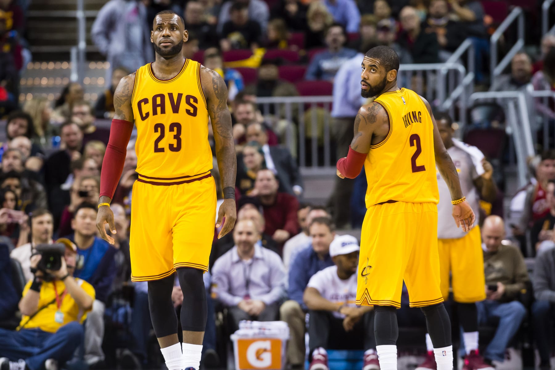 CLEVELAND, OH - JANUARY 25: LeBron James #23 of the Cleveland Cavaliers and Kyrie Irving #2 pause on the court during the first half against the Sacramento Kings at Quicken Loans Arena on January 25, 2017 in Cleveland, Ohio. NOTE TO USER: User expressly acknowledges and agrees that, by downloading and/or using this photograph, user is consenting to the terms and conditions of the Getty Images License Agreement. Mandatory copyright notice. (Photo by Jason Miller/Getty Images)