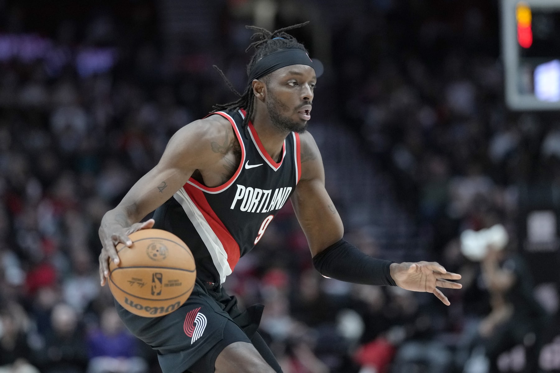 PORTLAND, OREGON - FEBRUARY 25: Jerami Grant #9 of the Portland Trail Blazers controls the ball during the second half against the Charlotte Hornets at Moda Center on February 25, 2024 in Portland, Oregon. NOTE TO USER: User expressly acknowledges and agrees that, by downloading and or using this photograph, User is consenting to the terms and conditions of the Getty Images License Agreement. (Photo by Soobum Im/Getty Images)