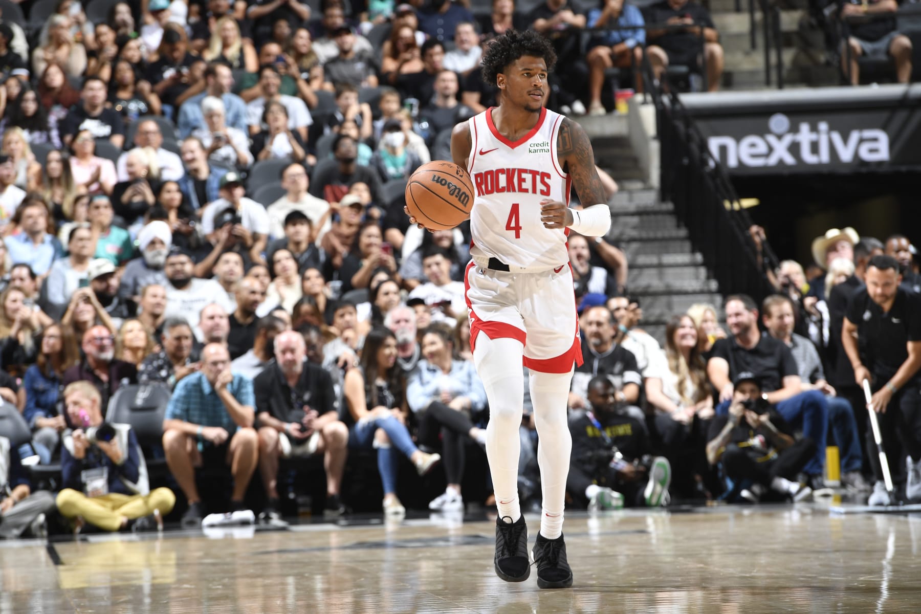 HOUSTON, TX - OCTOBER 27: Jalen Green #4 of the Houston Rockets brings the ball up court against the San Antonio Spurs  on October 27, 2023 at the Toyota Center in Houston, Texas. NOTE TO USER: User expressly acknowledges and agrees that, by downloading and or using this photograph, User is consenting to the terms and conditions of the Getty Images License Agreement. Mandatory Copyright Notice: Copyright 2023 NBAE (Photo by Logan Riely/NBAE via Getty Images)