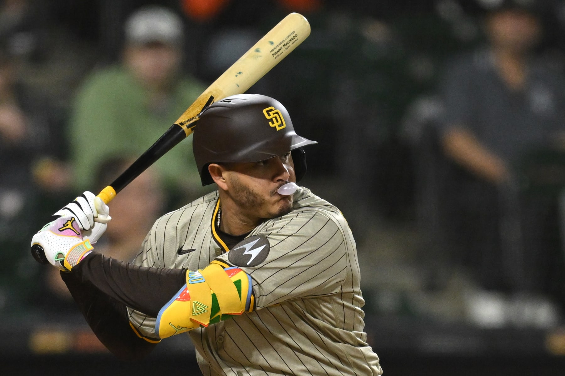 CHICAGO, ILLINOIS - SEPTEMBER 29: Manny Machado #13 of the San Diego Padres blows a bubble before hitting a single in the second inning off Dylan Cease of the Chicago White Sox at Guaranteed Rate Field on September 29, 2023 in Chicago, Illinois. (Photo by Quinn Harris/Getty Images)