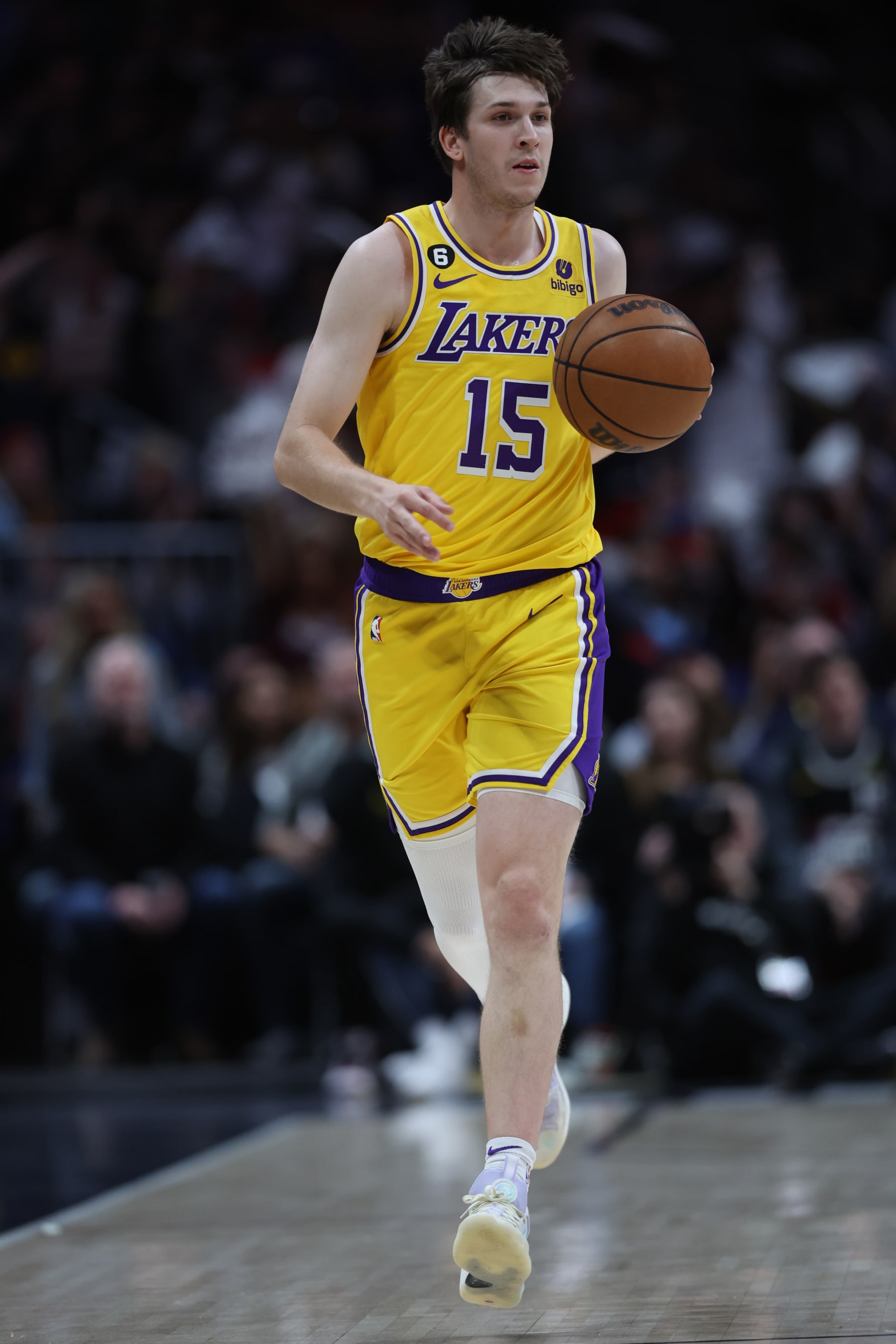 DENVER, COLORADO - MAY 18: Austin Reaves #15 of the Los Angeles Lakers dribbles during the first quarter against the Denver Nuggets in game two of the Western Conference Finals at Ball Arena on May 18, 2023 in Denver, Colorado. NOTE TO USER: User expressly acknowledges and agrees that, by downloading and or using this photograph, User is consenting to the terms and conditions of the Getty Images License Agreement. (Photo by Matthew Stockman/Getty Images)