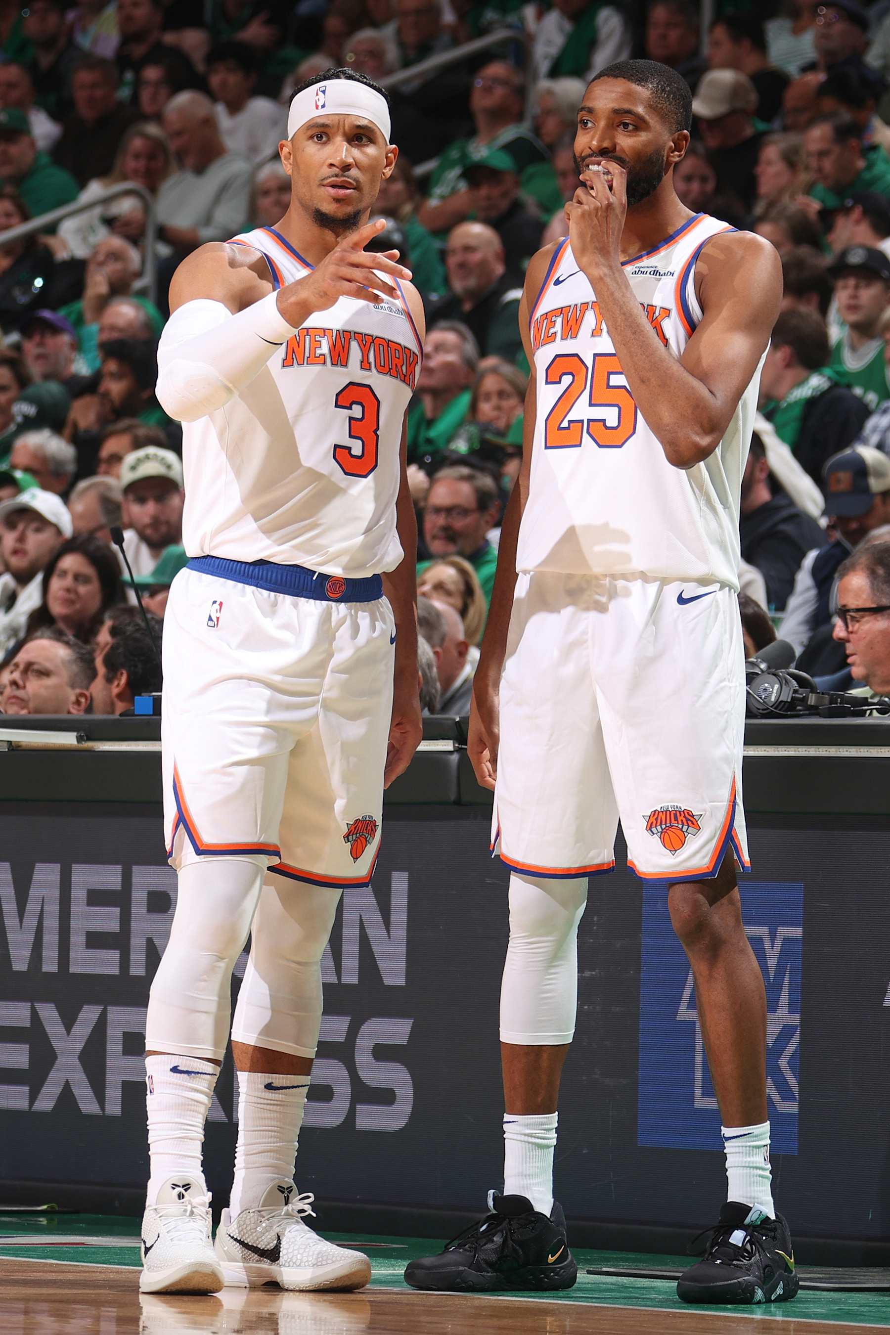 BOSTON, MA - OCTOBER 22: Mikal Bridges #25 and Josh Hart #3 of the New York Knicks look on during the game against the Boston Celtics on October 22, 2024 at TD Garden in Boston, Massachusetts. NOTE TO USER: User expressly acknowledges and agrees that, by downloading and or using this Photograph, user is consenting to the terms and conditions of the Getty Images License Agreement. Mandatory Copyright Notice: Copyright 2024 NBAE (Photo by Nathaniel S. Butler/NBAE via Getty Images)