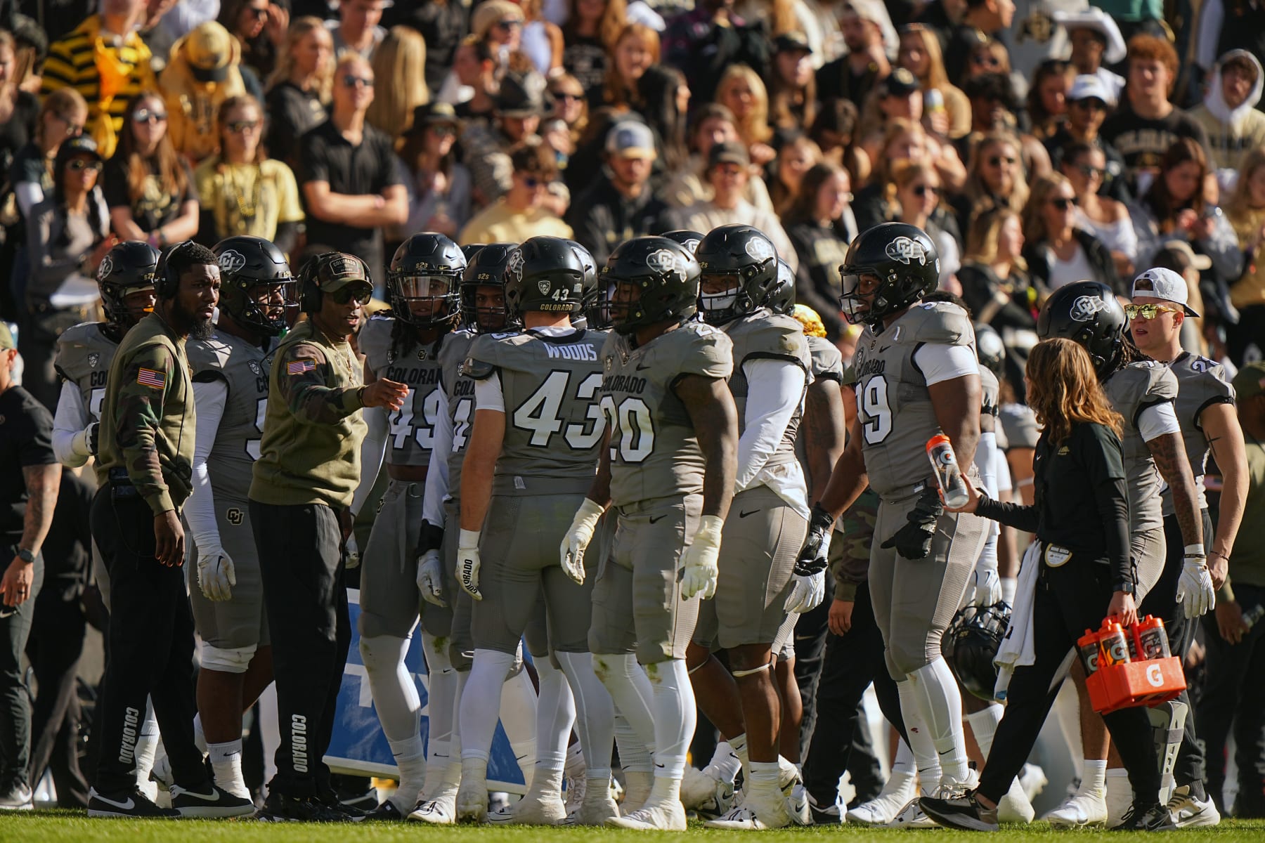 College Football: Colorado head coach Deion Sanders and assistant coach Nick Williams talks to the team vs Arizona at Folsom Field. 
Boulder, CO 11/11/2023 
CREDIT: Erick W. Rasco (Photo by Erick W. Rasco/Sports Illustrated via Getty Images) 
(Set Number: X164462)