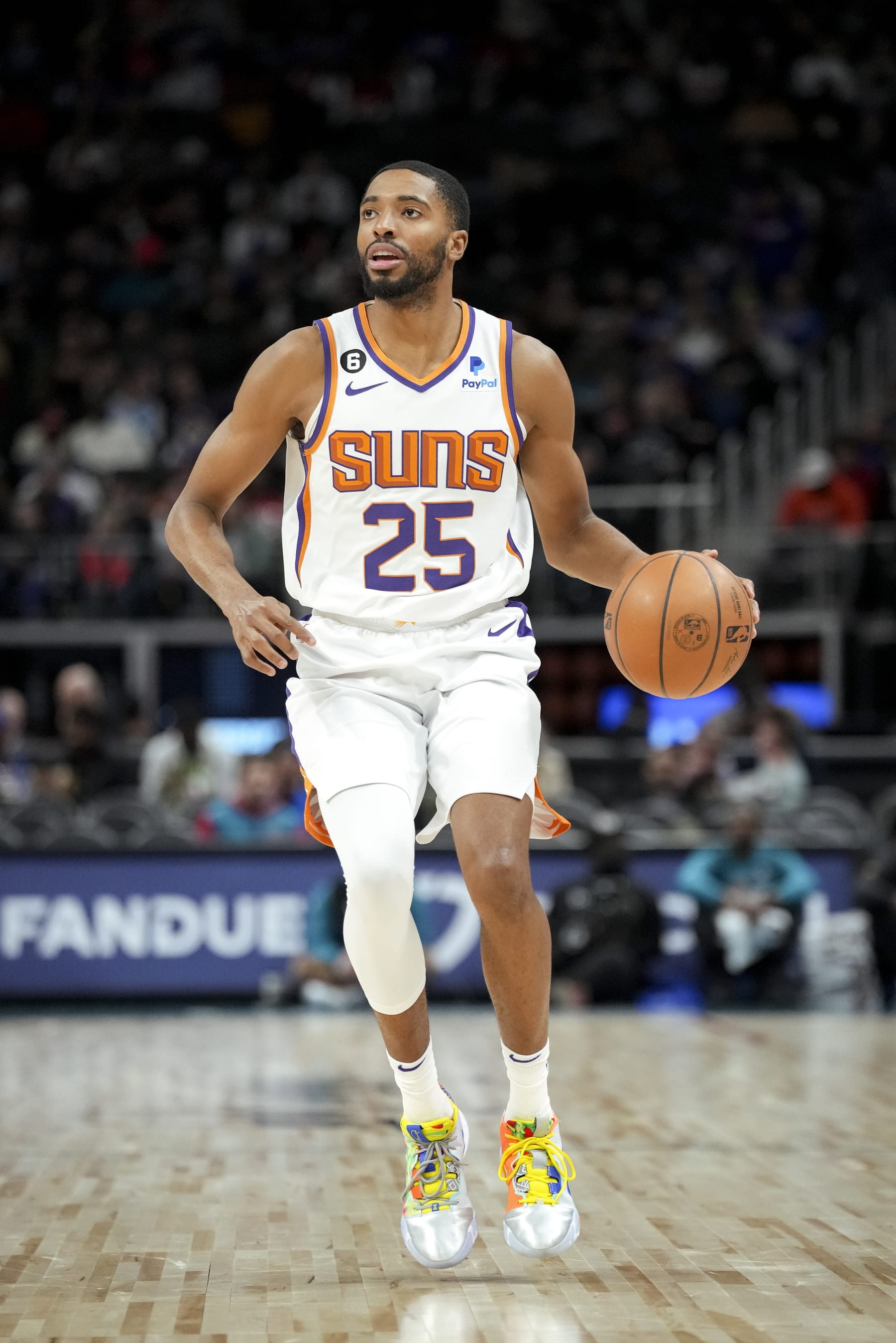 DETROIT, MICHIGAN - FEBRUARY 04: Mikal Bridges #25 of the Phoenix Suns handles the ball against the Detroit Pistons during the third quarter of the game at Little Caesars Arena on February 04, 2023 in Detroit, Michigan. NOTE TO USER: User expressly acknowledges and agrees that, by downloading and or using this photograph, User is consenting to the terms and conditions of the Getty Images License Agreement. (Photo by Nic Antaya/Getty Images)
