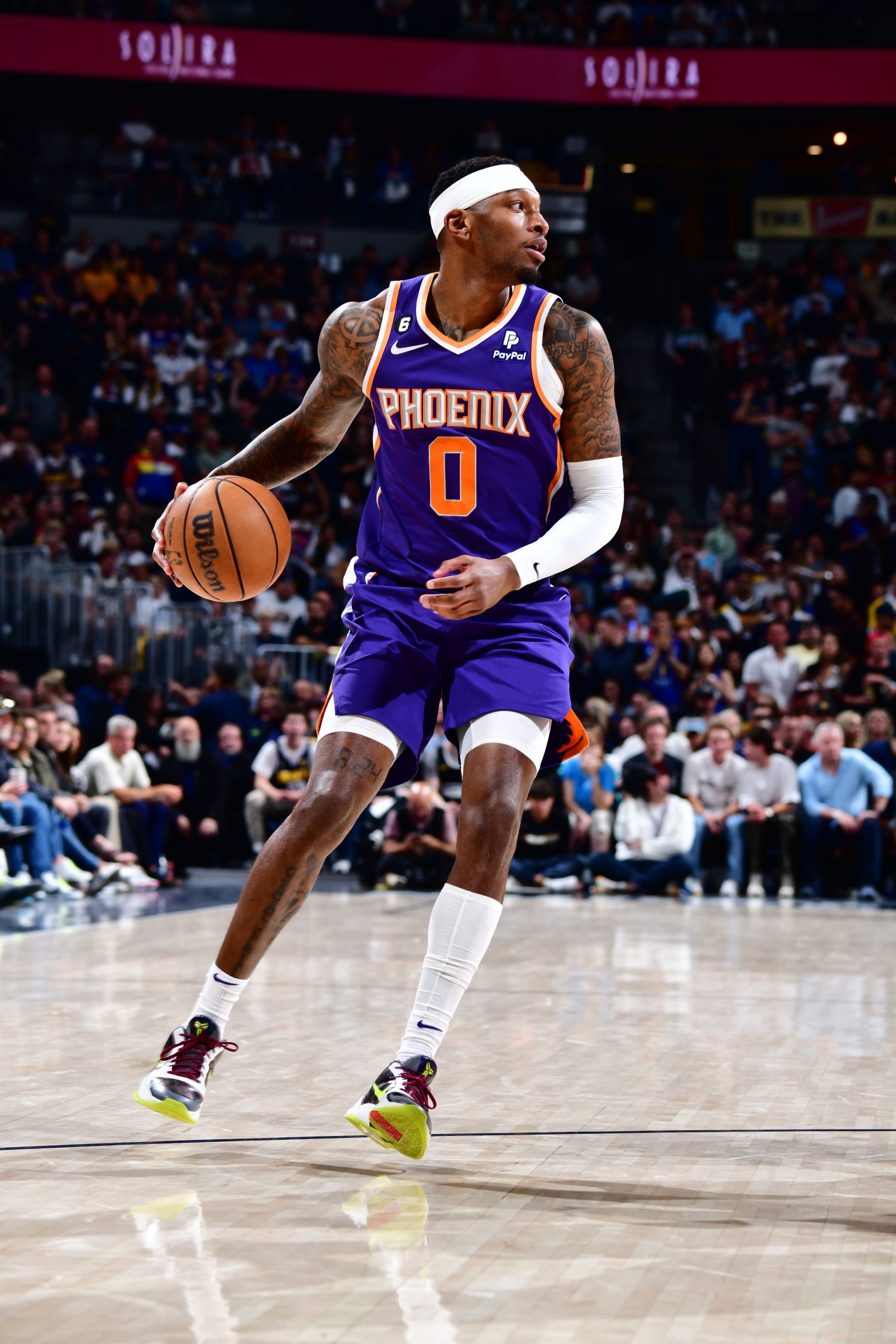 DENVER, CO - MAY 9: Torrey Craig #0 of the Phoenix Suns handles the ball during Game Five of the Western Conference Semi-Finals of the 2023 NBA Playoffs against the Denver Nuggets on May 9, 2023 at the Ball Arena in Denver, Colorado. NOTE TO USER: User expressly acknowledges and agrees that, by downloading and/or using this Photograph, user is consenting to the terms and conditions of the Getty Images License Agreement. Mandatory Copyright Notice: Copyright 2023 NBAE (Photo by Barry Gossage/NBAE via Getty Images)