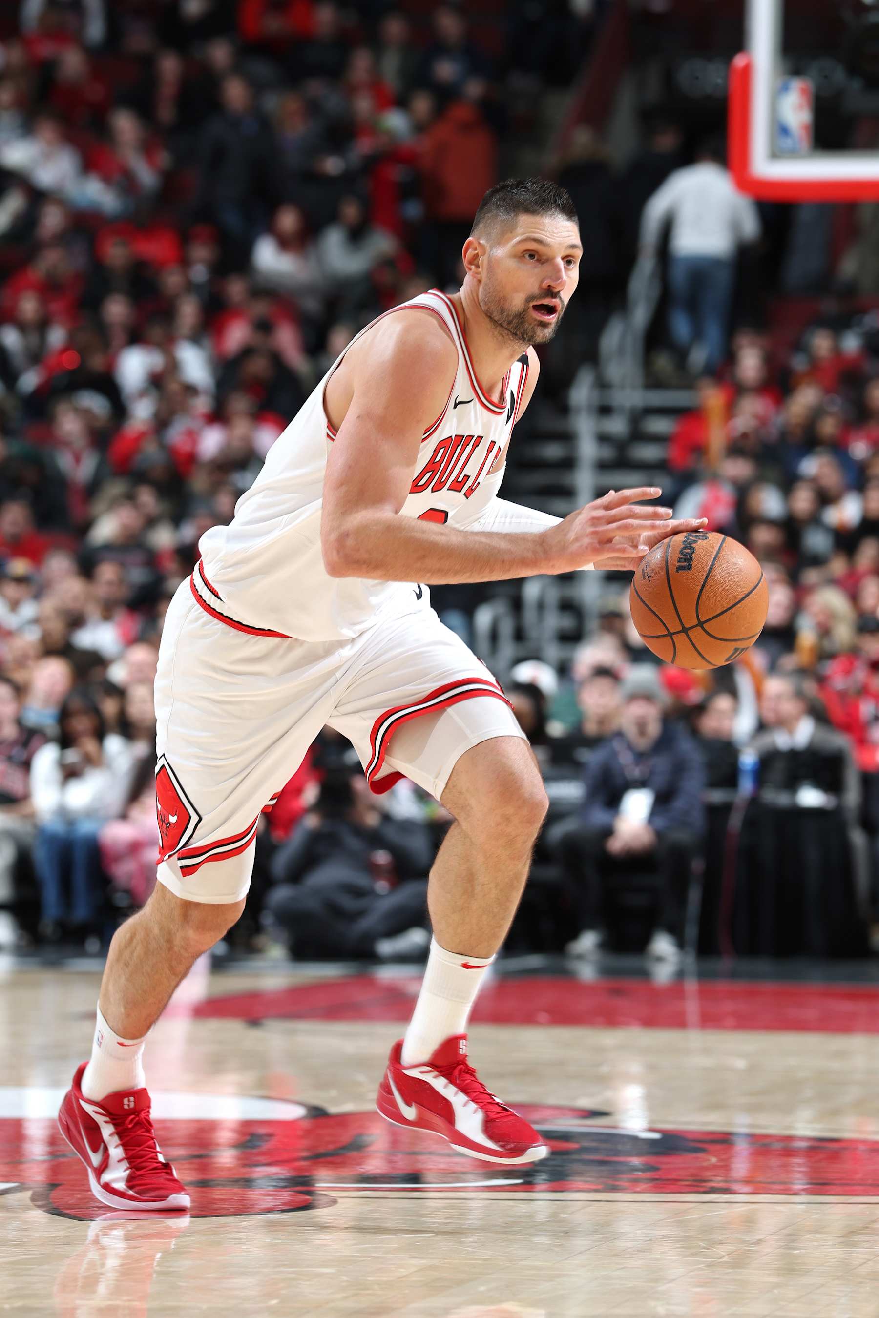 CHICAGO, IL - JANUARY 15: Nikola Vucevic #9 of the Chicago Bulls handles the ball during the game against the Atlanta Hawks on January 15, 2025 at United Center in Chicago, Illinois. NOTE TO USER: User expressly acknowledges and agrees that, by downloading and or using this photograph, User is consenting to the terms and conditions of the Getty Images License Agreement. Mandatory Copyright Notice: Copyright 2025 NBAE (Photo by Jeff Haynes/NBAE via Getty Images)