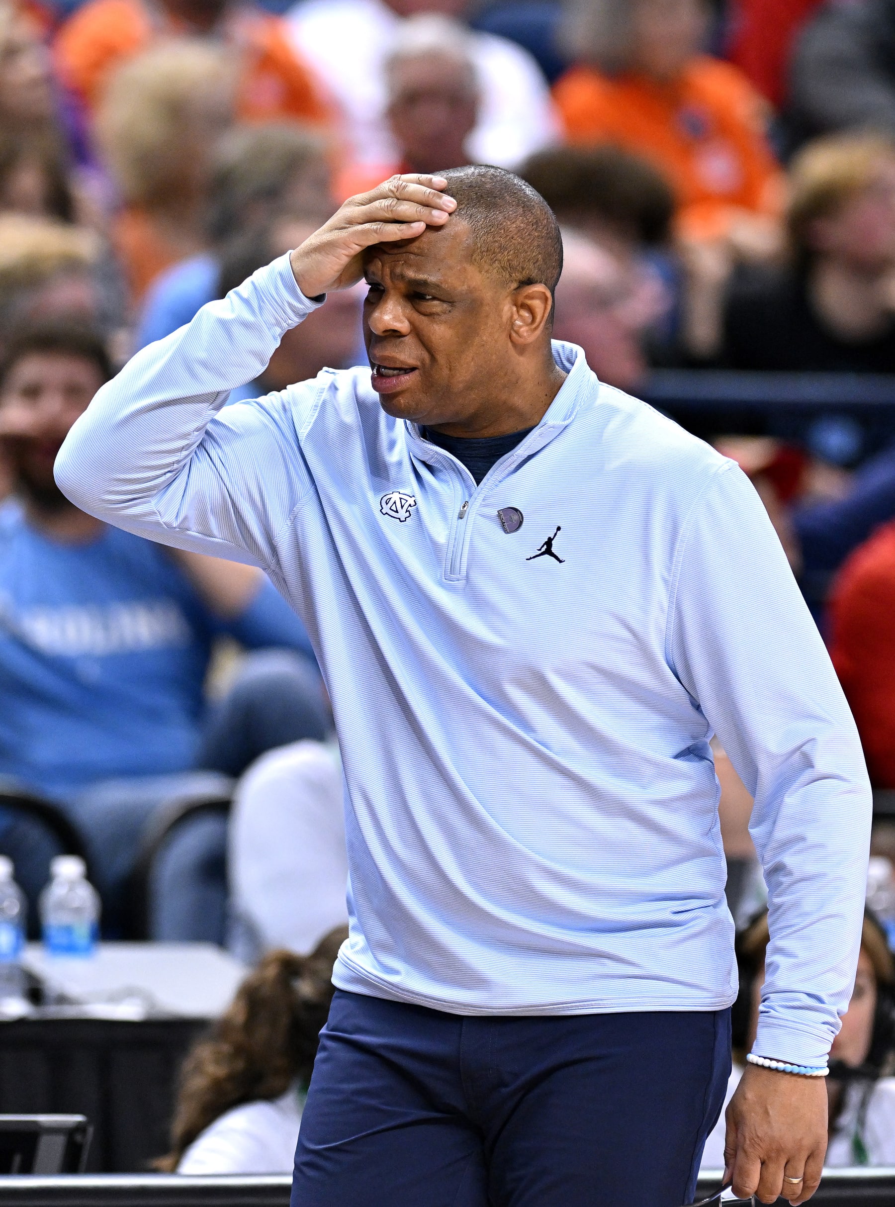 GREENSBORO, NORTH CAROLINA - MARCH 09: Head coach Hubert Davis of the North Carolina Tar Heels reacts during the second half against the Virginia Cavaliers in the quarterfinals of the ACC Basketball Tournament at Greensboro Coliseum on March 09, 2023 in Greensboro, North Carolina. (Photo by Grant Halverson/Getty Images)