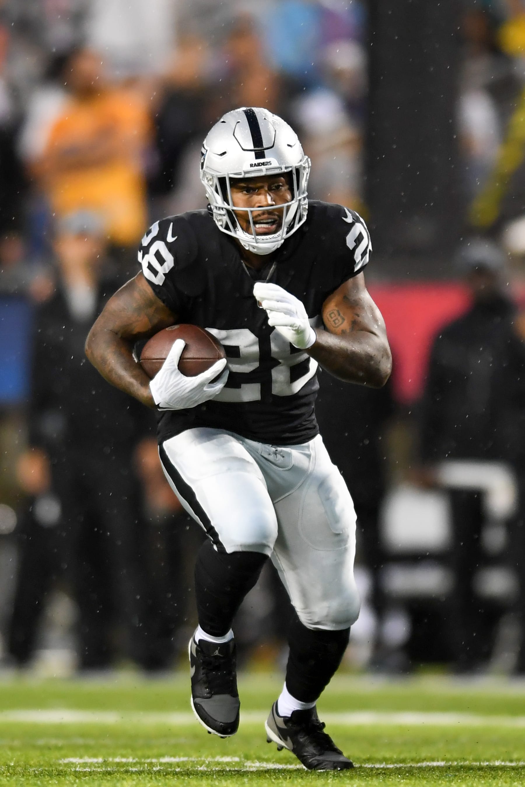 CANTON, OH - AUGUST 04: Josh Jacobs #28 of the Las Vegas Raiders carries the ball during the first half of the 2022 Pro Football Hall of Fame Game against the Jacksonville Jaguars at Tom Benson Hall of Fame Stadium on August 04, 2022 in Canton, Ohio. (Photo by Nick Cammett/Diamond Images via Getty Images)