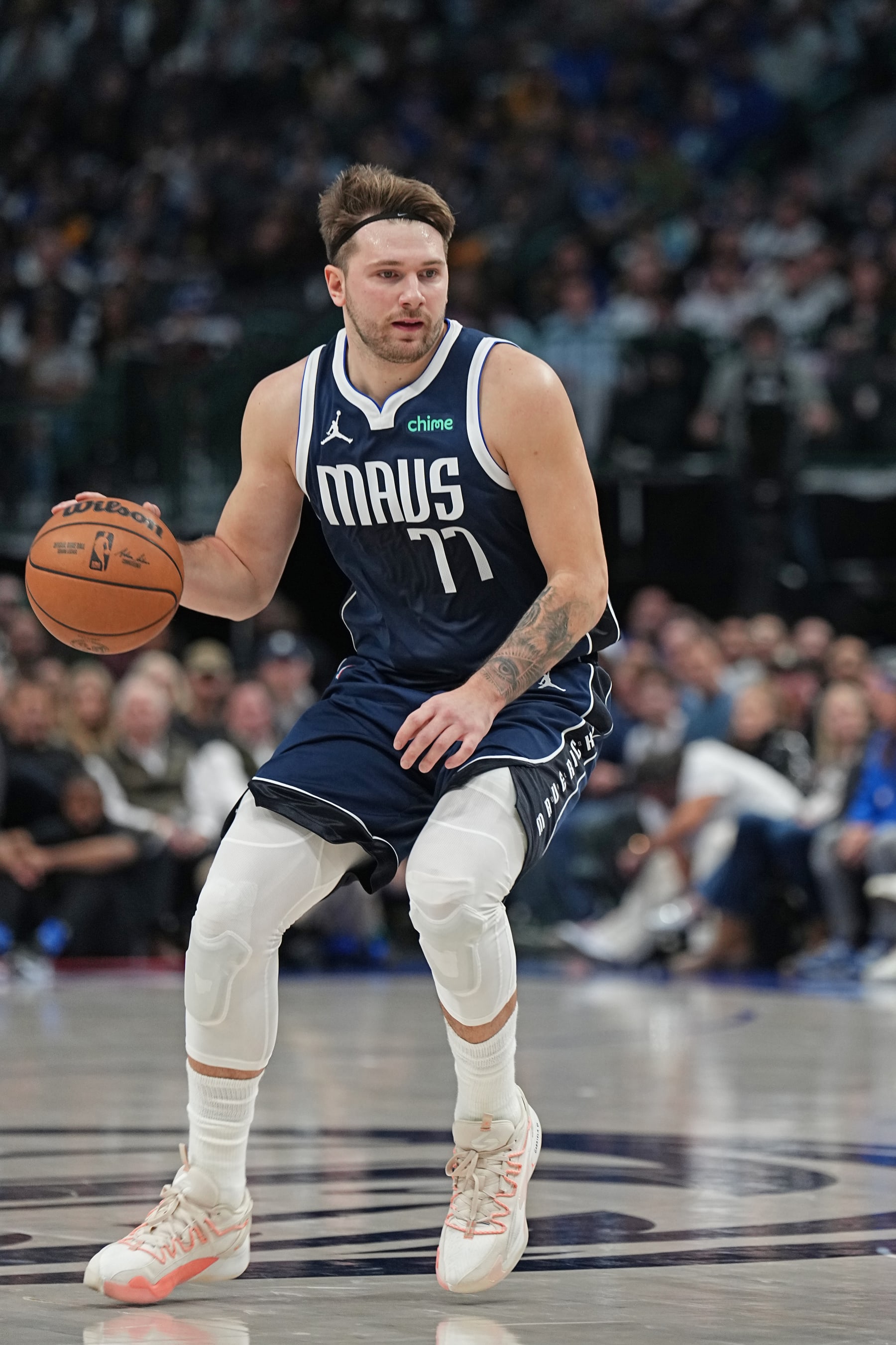 DALLAS, TX - DECEMBER 12: Luka Doncic #77 of the Dallas Mavericks dribbles the ball during the game against the Los Angeles Lakers on December 12, 2023 at the American Airlines Center in Dallas, Texas. NOTE TO USER: User expressly acknowledges and agrees that, by downloading and or using this photograph, User is consenting to the terms and conditions of the Getty Images License Agreement. Mandatory Copyright Notice: Copyright 2023 NBAE (Photo by Glenn James/NBAE via Getty Images)