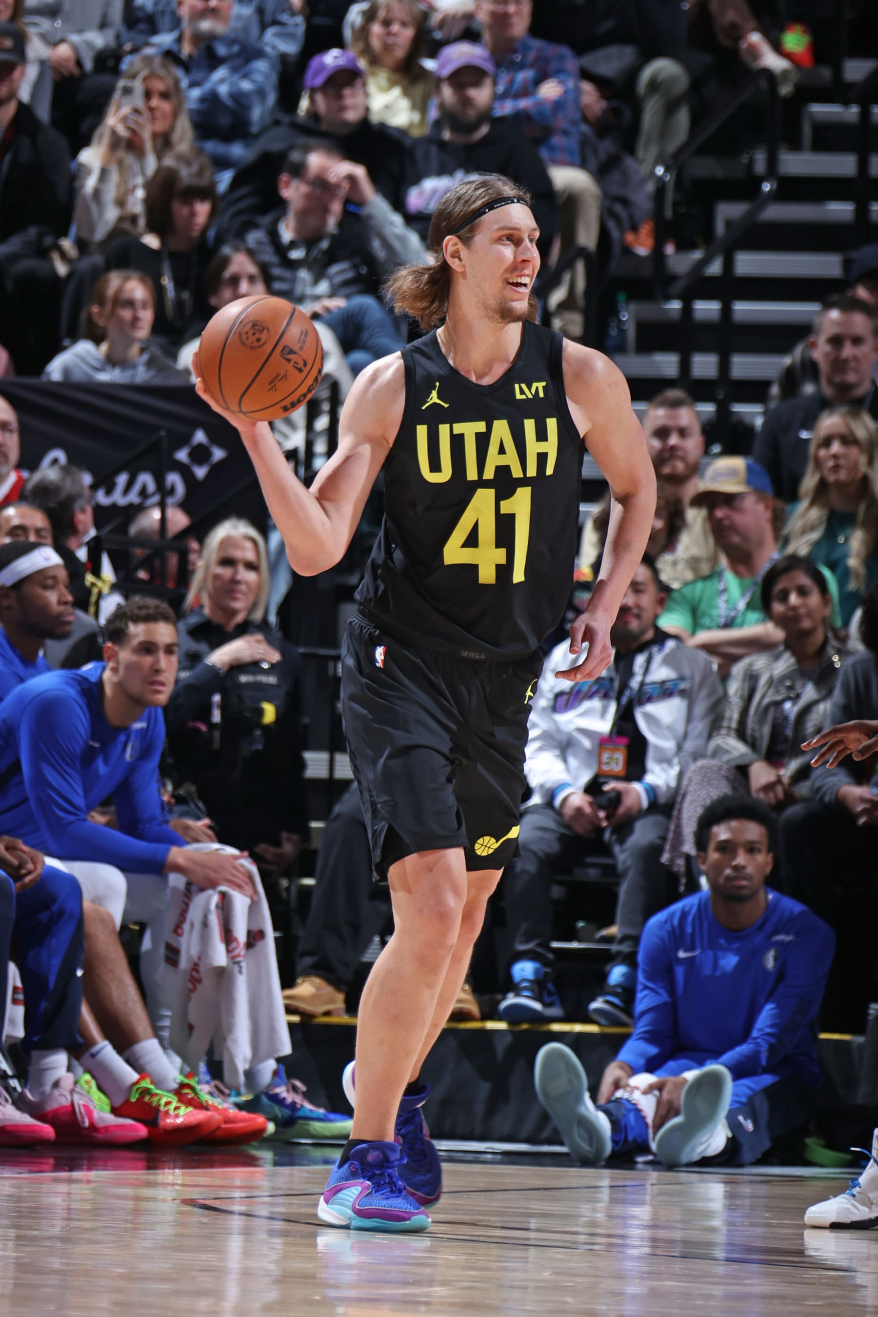 SALT LAKE CITY, UT - JANUARY 1: Kelly Olynyk #41 of the Utah Jazz passes the ball during the game against the Dallas Mavericks on January 1, 2024 at vivint.SmartHome Arena in Salt Lake City, Utah. NOTE TO USER: User expressly acknowledges and agrees that, by downloading and or using this Photograph, User is consenting to the terms and conditions of the Getty Images License Agreement. Mandatory Copyright Notice: Copyright 2024 NBAE (Photo by Melissa Majchrzak/NBAE via Getty Images)