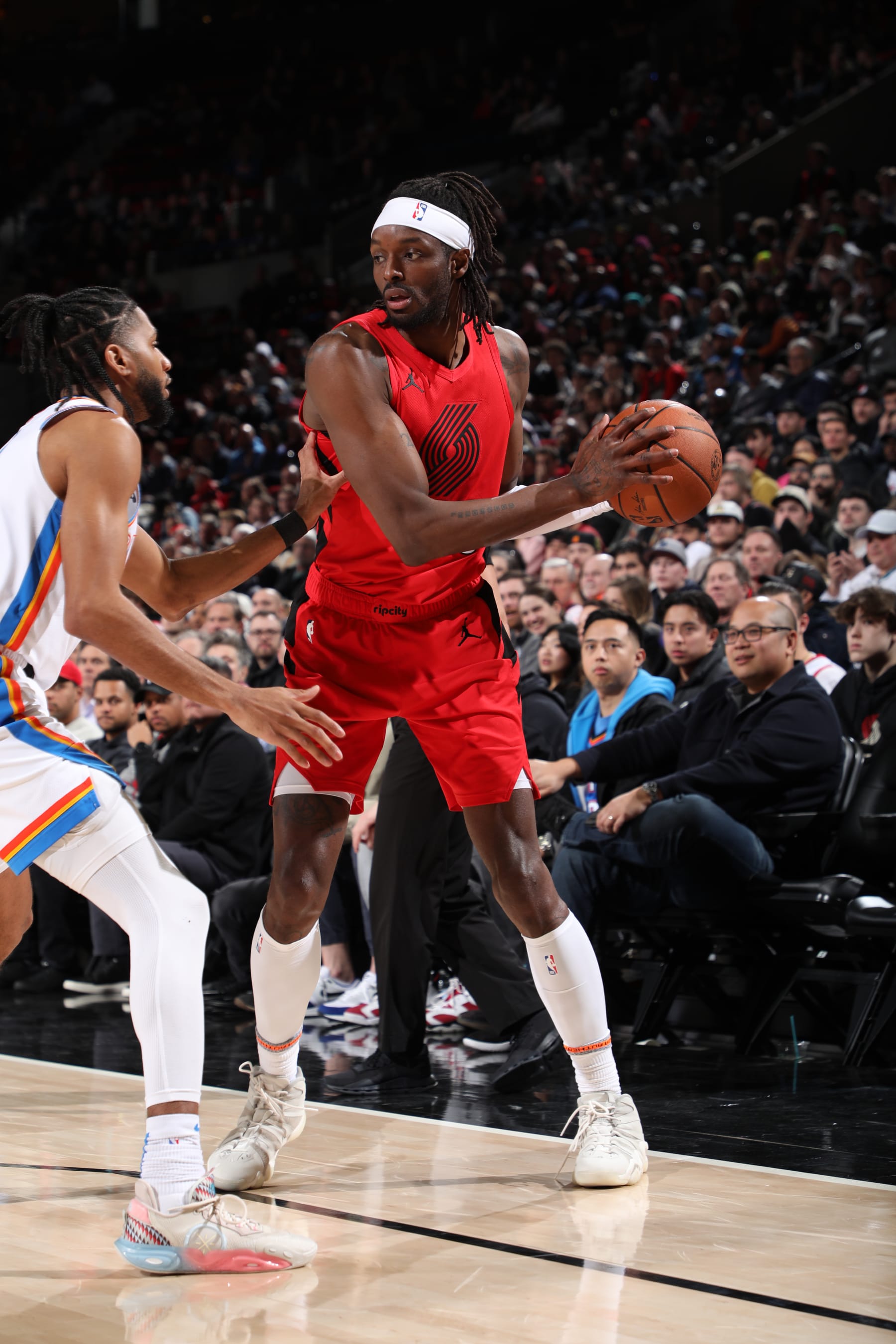 PORTLAND, OR - MARCH 6: Jerami Grant #9 of the Portland Trail Blazers handles the ball during the game against the Oklahoma City Thunder on March 6, 2024 at the Moda Center Arena in Portland, Oregon. NOTE TO USER: User expressly acknowledges and agrees that, by downloading and or using this photograph, user is consenting to the terms and conditions of the Getty Images License Agreement. Mandatory Copyright Notice: Copyright 2024 NBAE (Photo by Cameron Browne/NBAE via Getty Images)